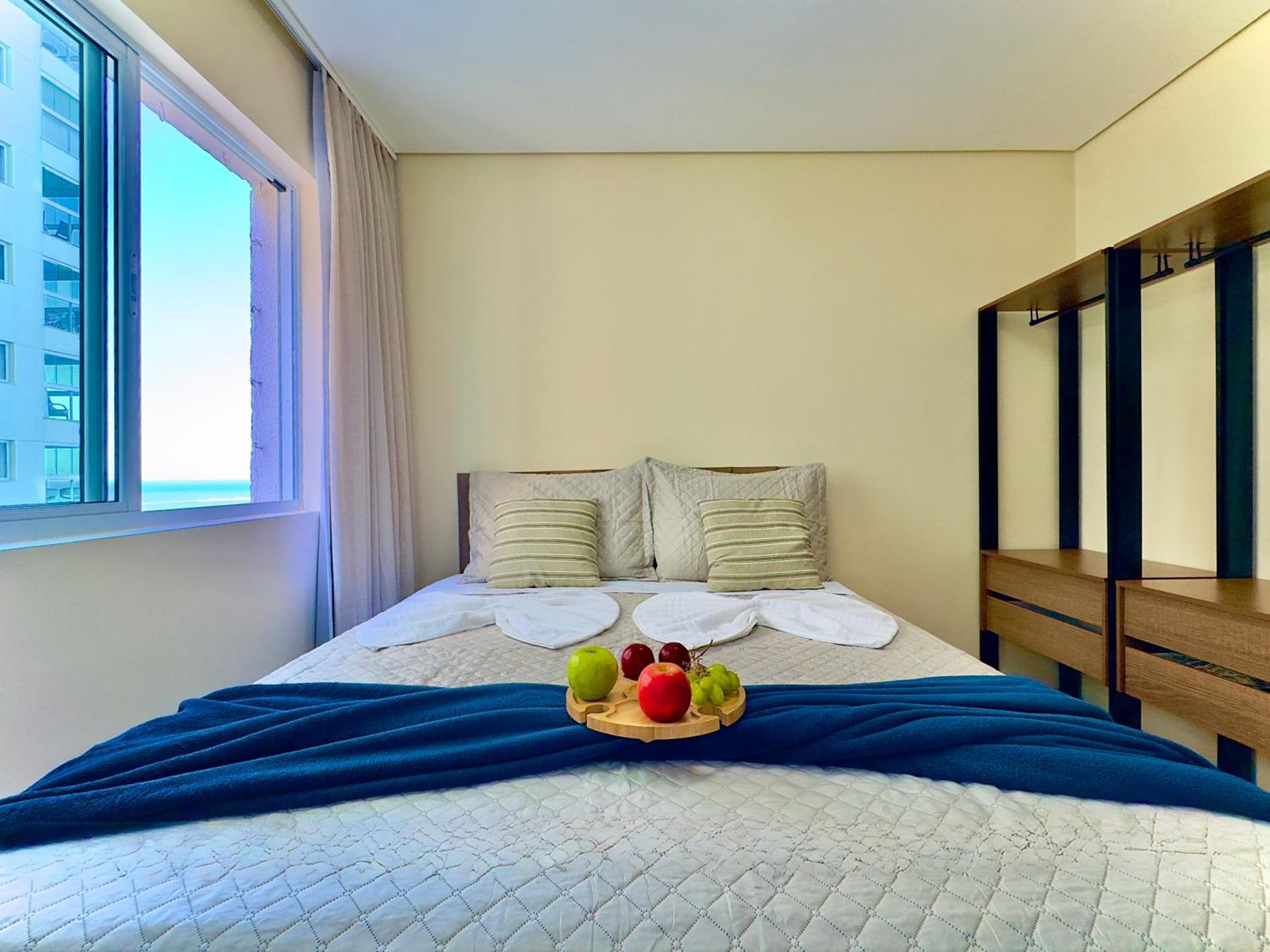 Apto Frente Mar Bali Beach Home Club 3 Quartos Climatizados Cozinha Completa Sacada com Churrasqueira 2 Vagas de Garagem Piscina borda infinita Sauna Acade