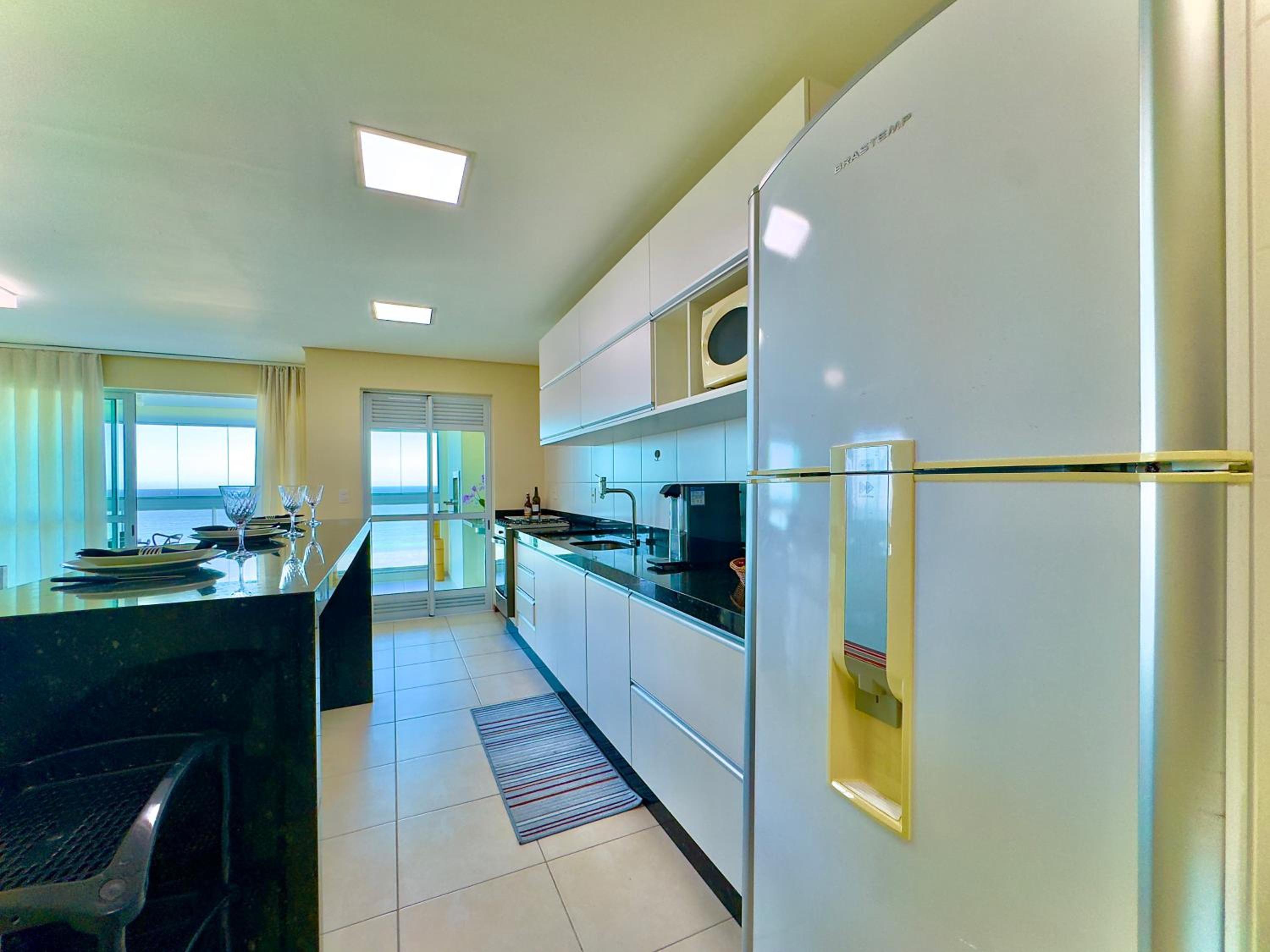 Apto Frente Mar Bali Beach Home Club 3 Quartos Climatizados Cozinha Completa Sacada com Churrasqueira 2 Vagas de Garagem Piscina borda infinita Sauna Acade