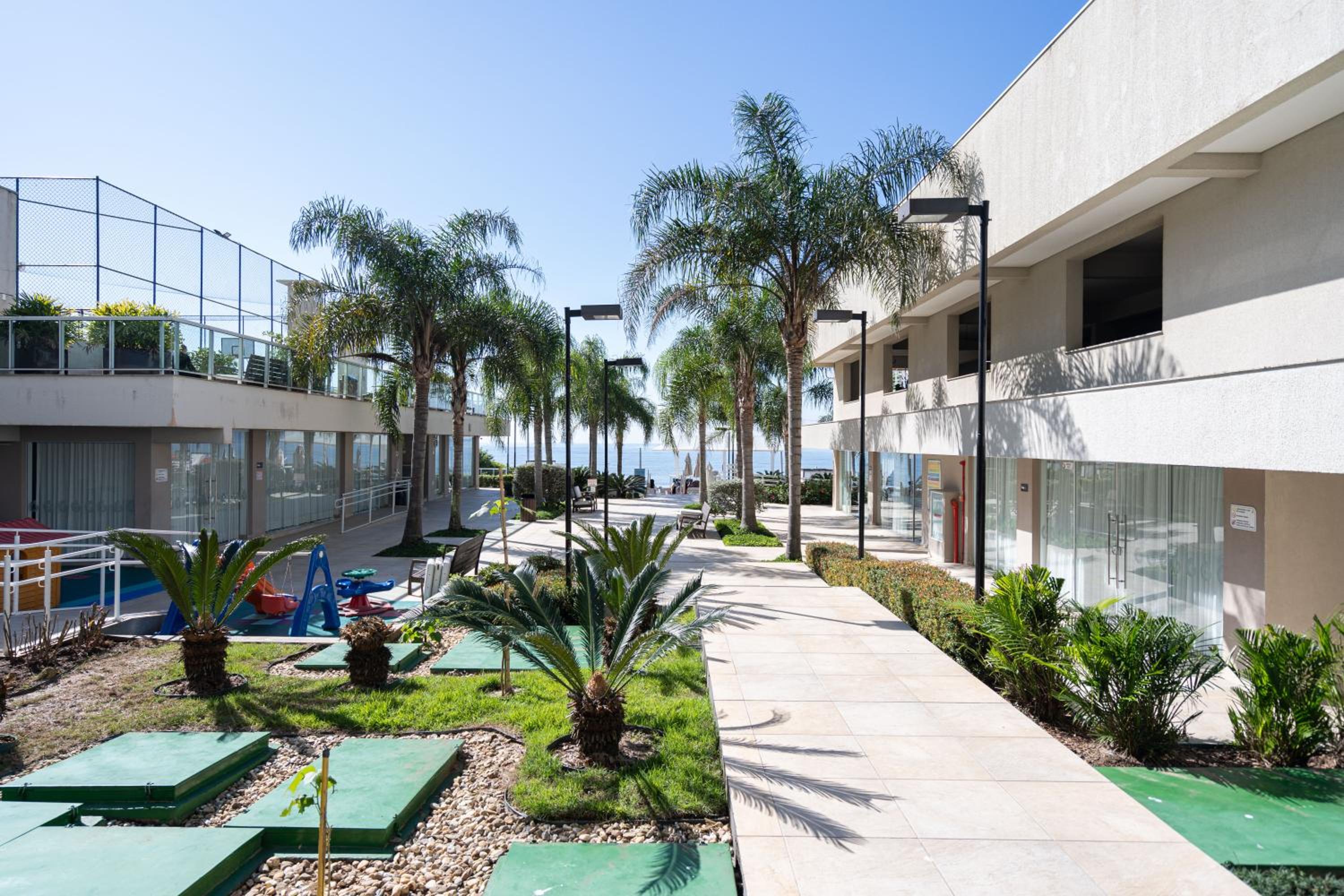 Apto Frente Mar Bali Beach Home Club 3 Quartos Climatizados Cozinha Completa Sacada com Churrasqueira 2 Vagas de Garagem Piscina borda infinita Sauna Acade