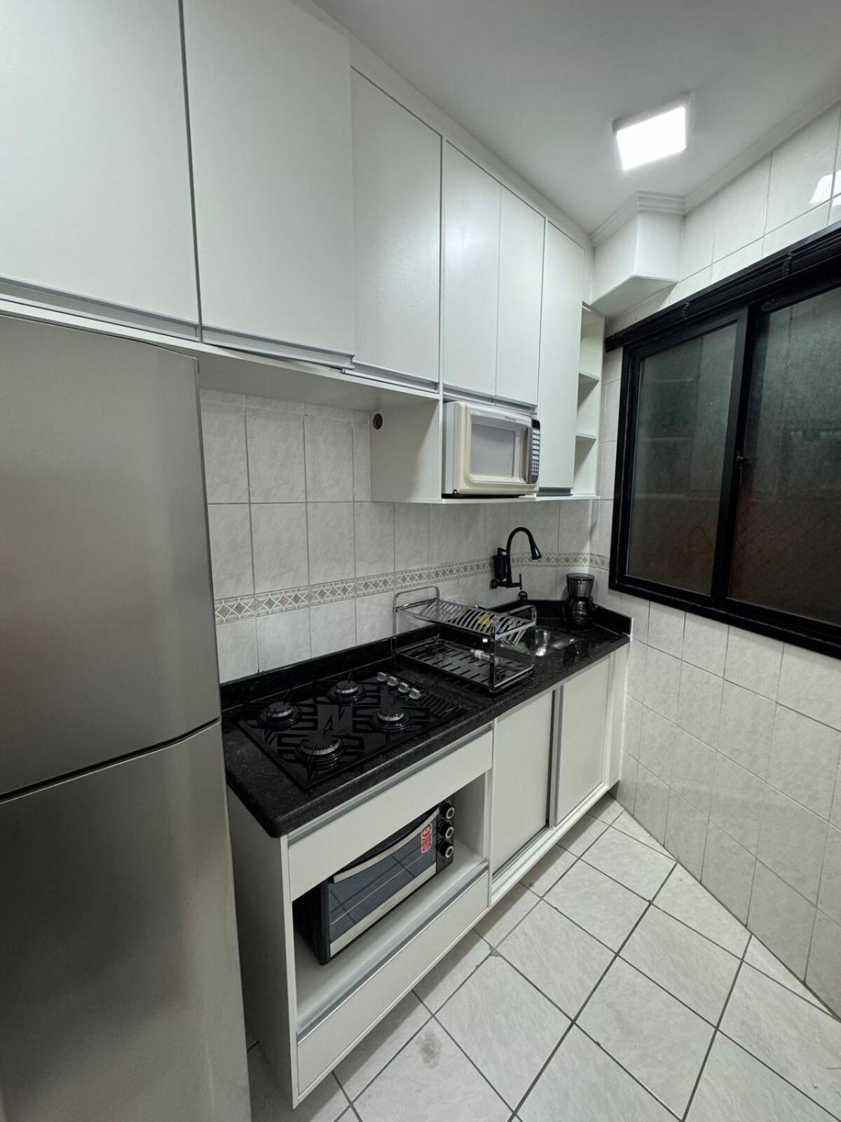 Luizabela - apartamento pé na areia Praia Grande