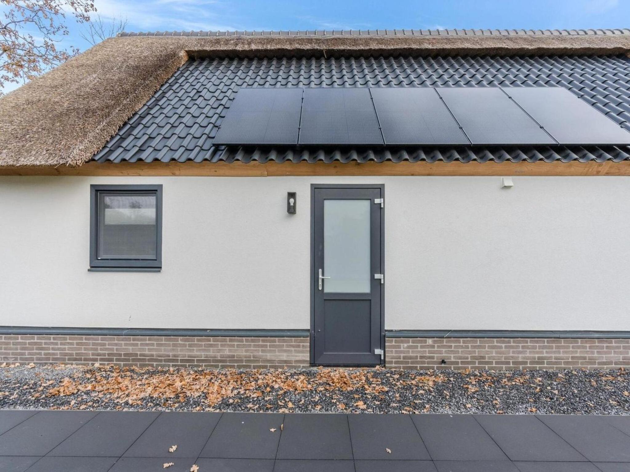 Modern bungalow in Baarle-Nassau with pond view