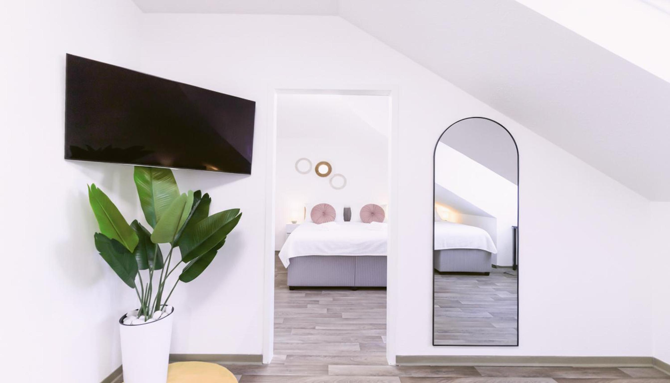 nestup - Zentrales Apartment mit Boxspringbetten, Smart-TV und ausgestatteter Küche