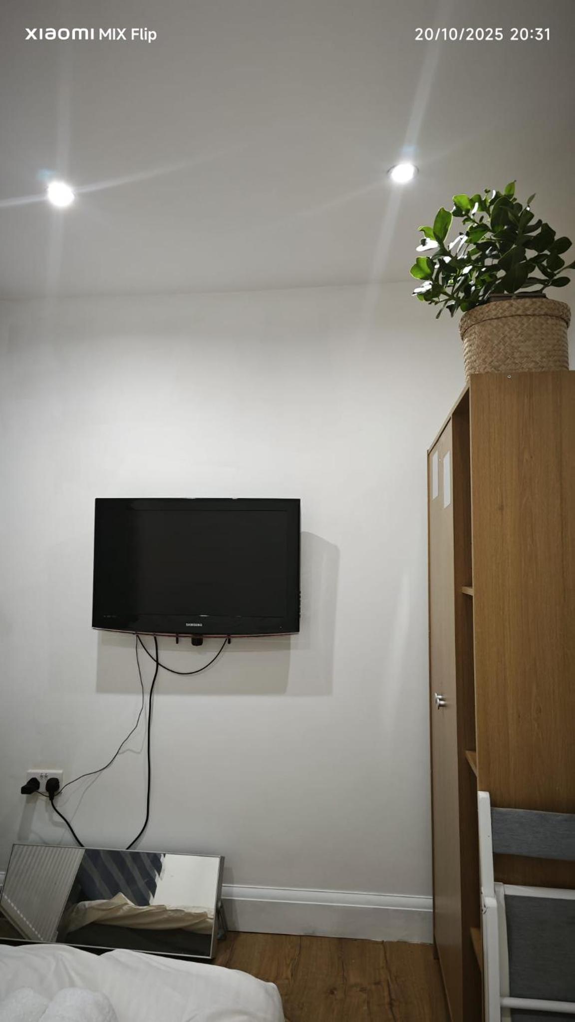 Private guest suite inside a family home with own entrance, kitchen, and bathroom