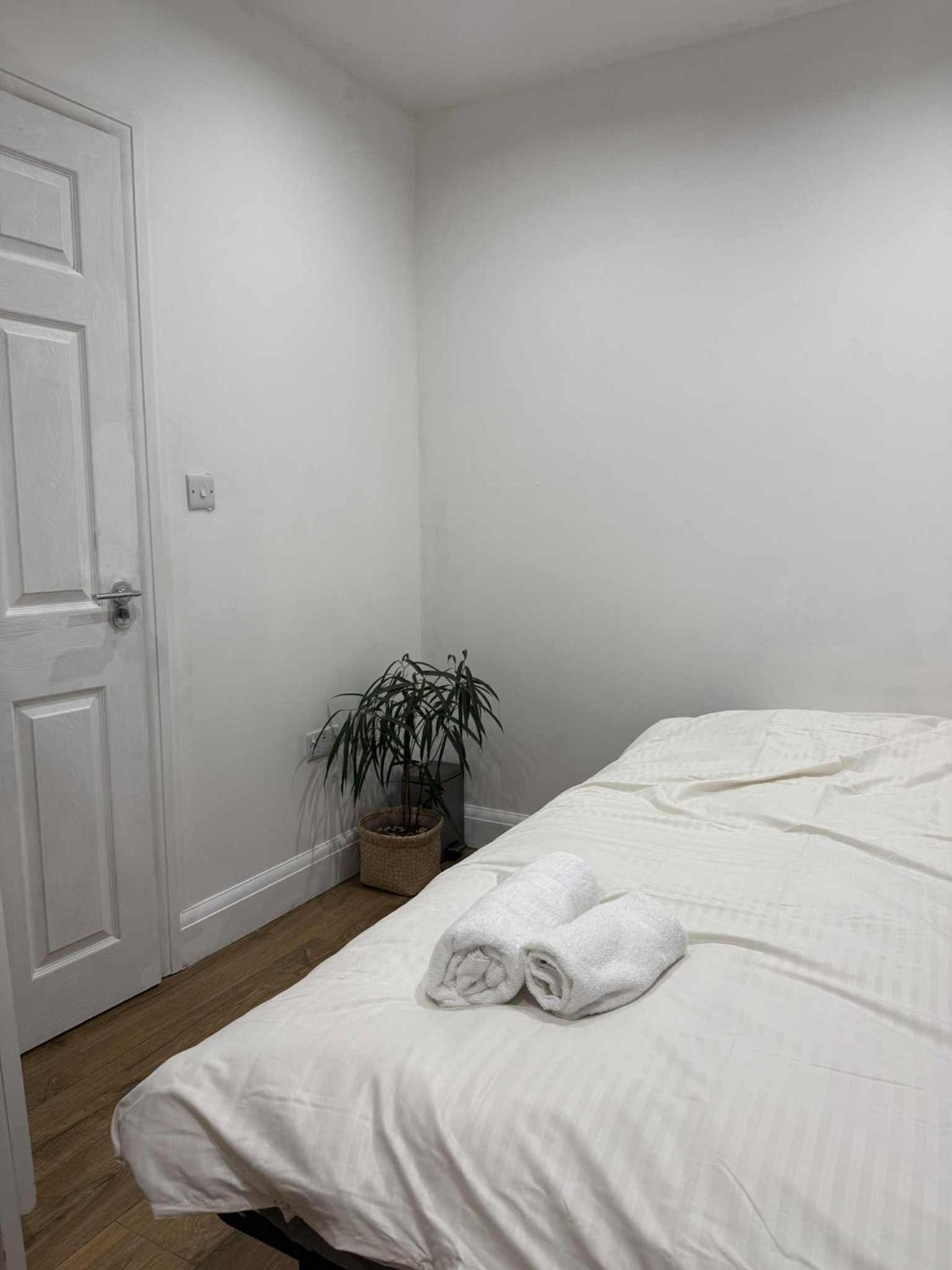 Private guest suite inside a family home with own entrance, kitchen, and bathroom