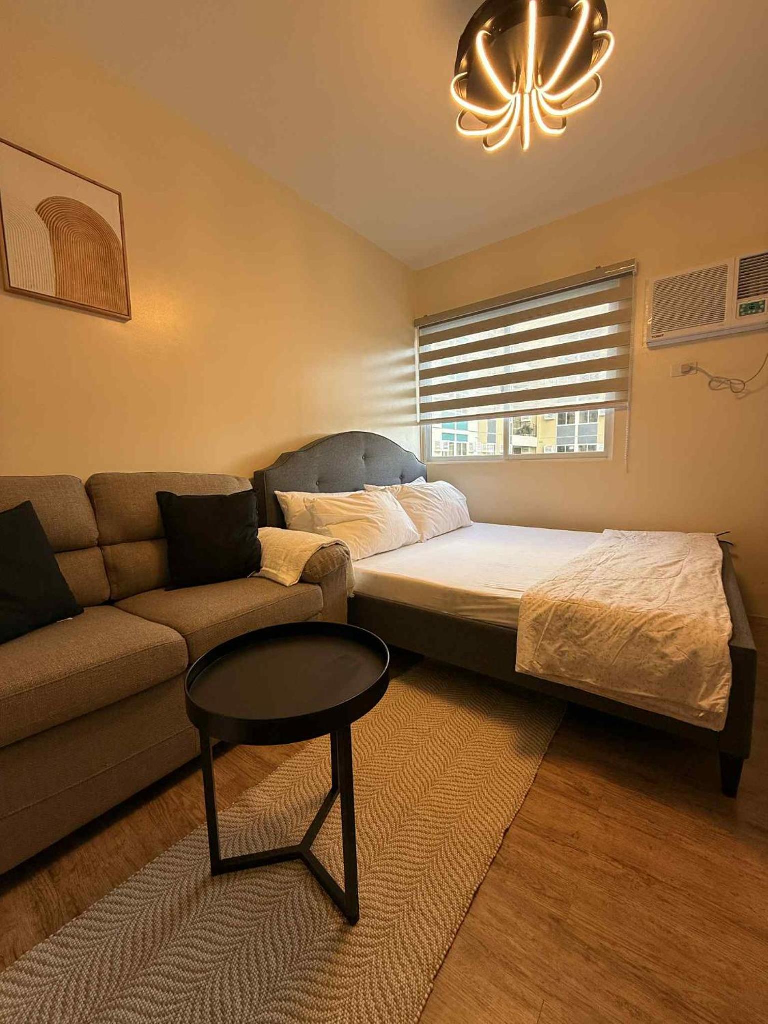 Urban Oasis Cozy Studio at Berkeley Suites South Forbes Nuvali