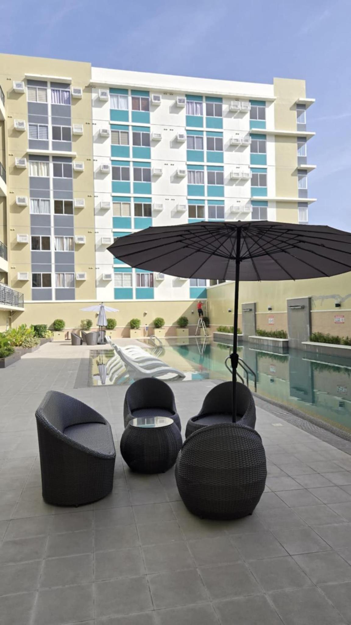 Urban Oasis Cozy Studio at Berkeley Suites South Forbes Nuvali