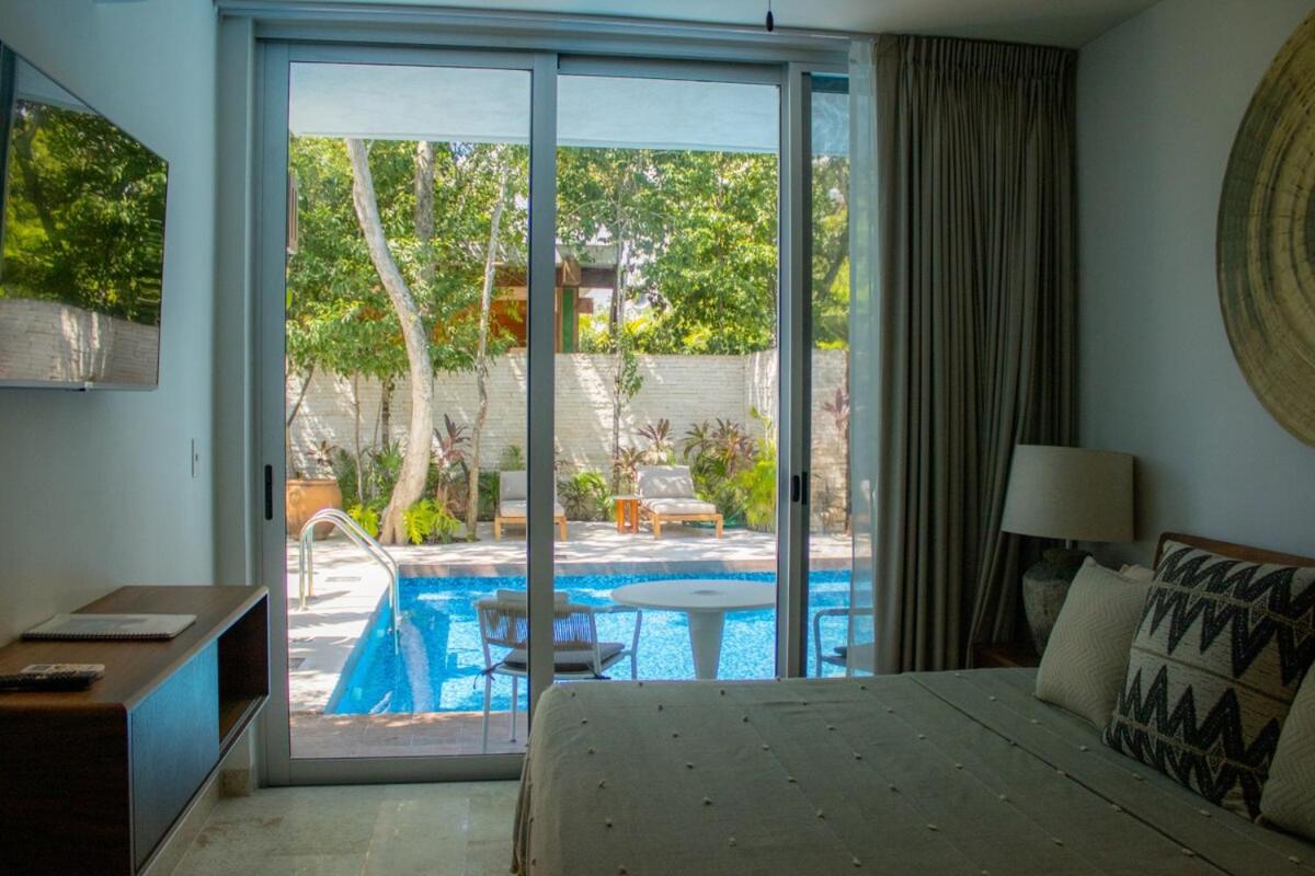 NHOA 111A Lux 2BR Condo Pool access in Aldea Zama