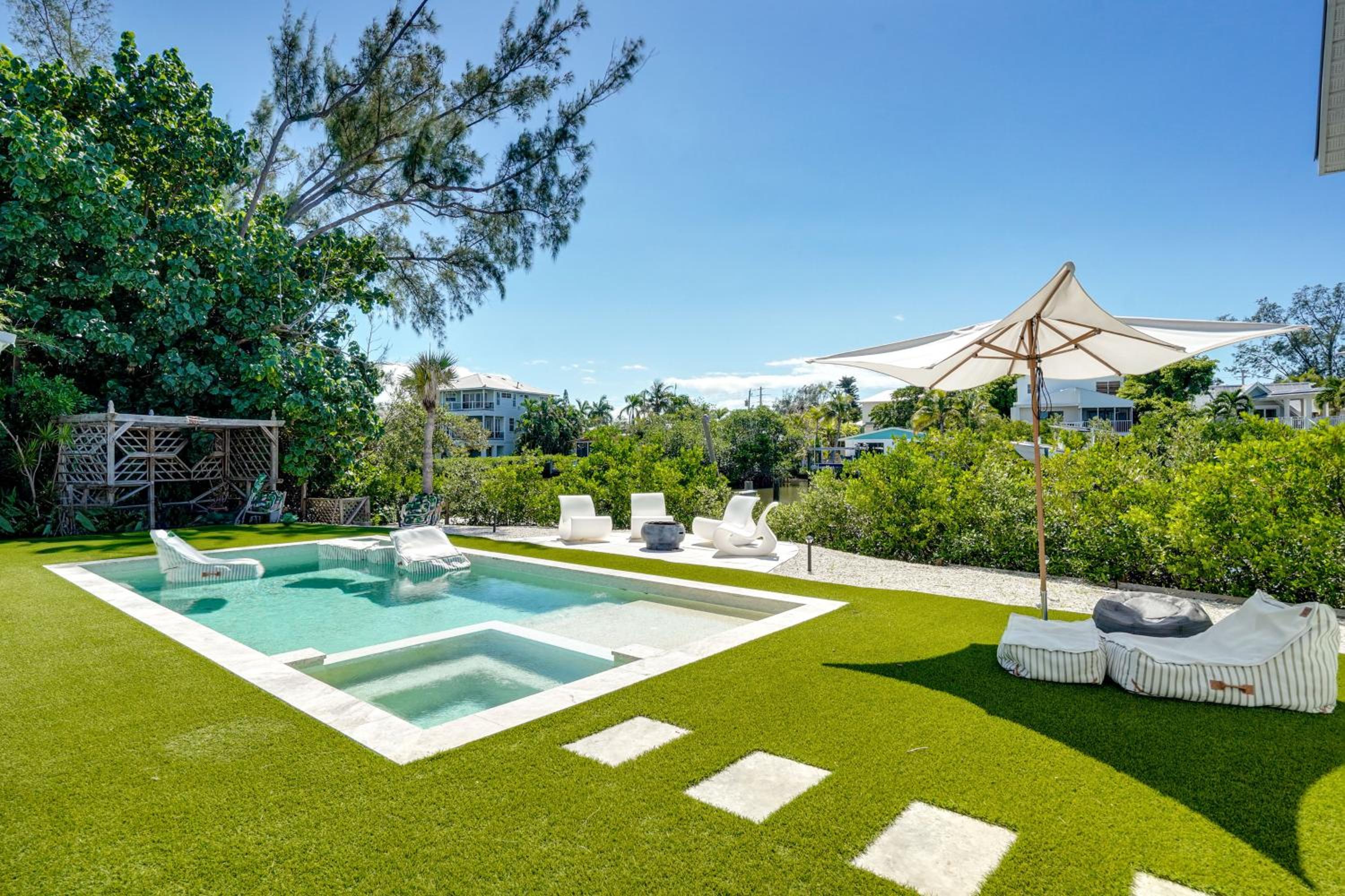 Steps to Bean Point Beach Family Home with Pool