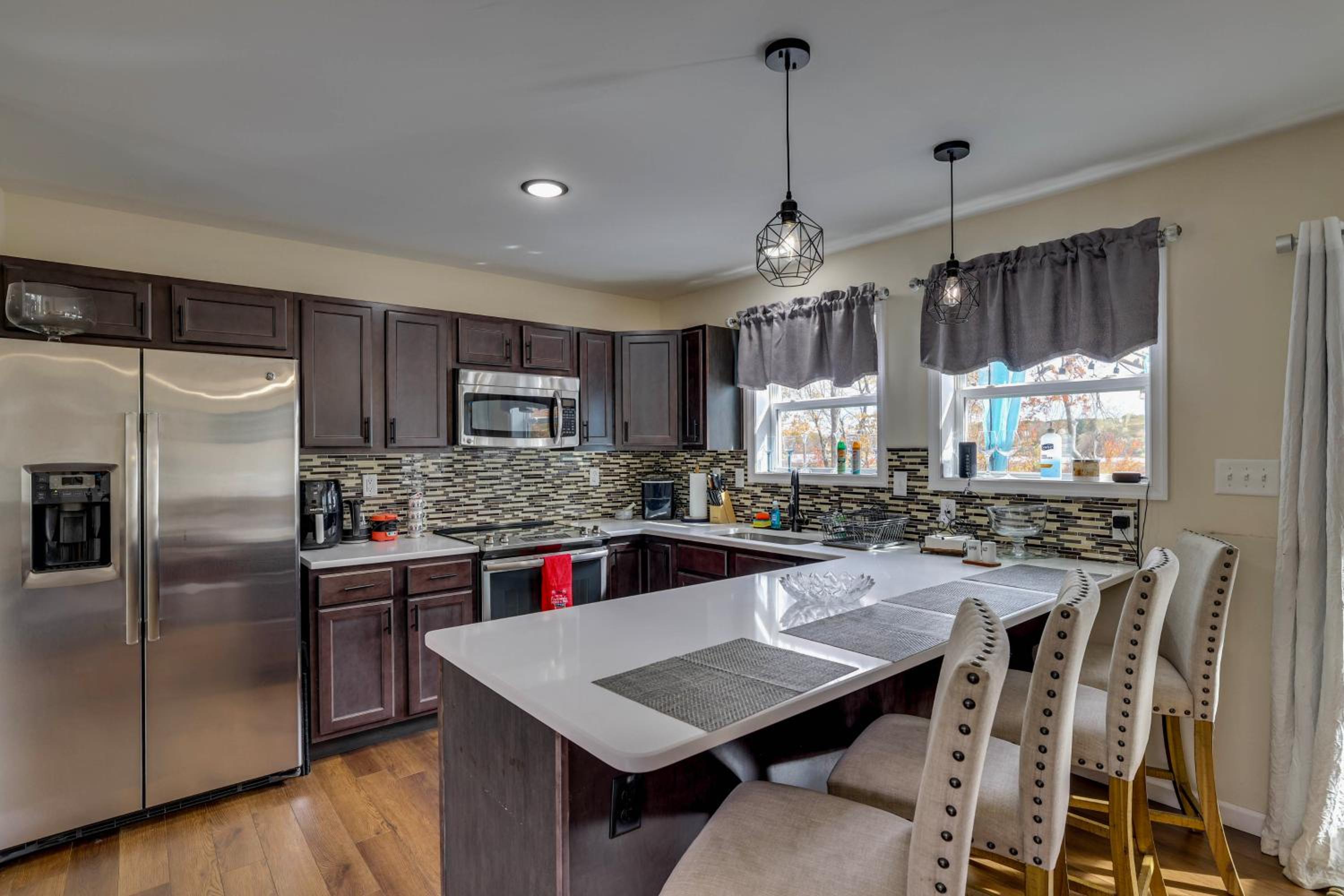 Lakefront Pocono Retreat with Hot Tub and Movie Hub