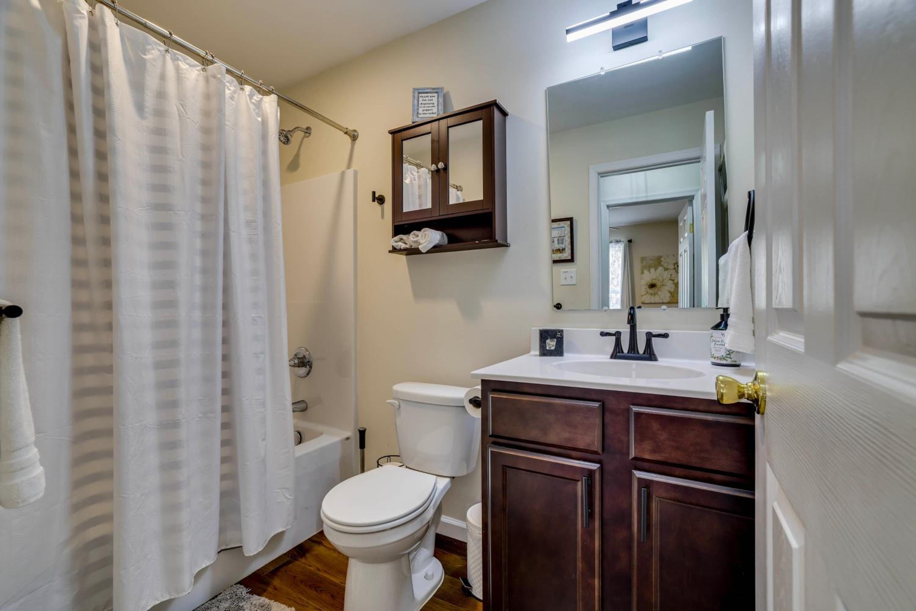 Lakefront Pocono Retreat with Hot Tub and Movie Hub