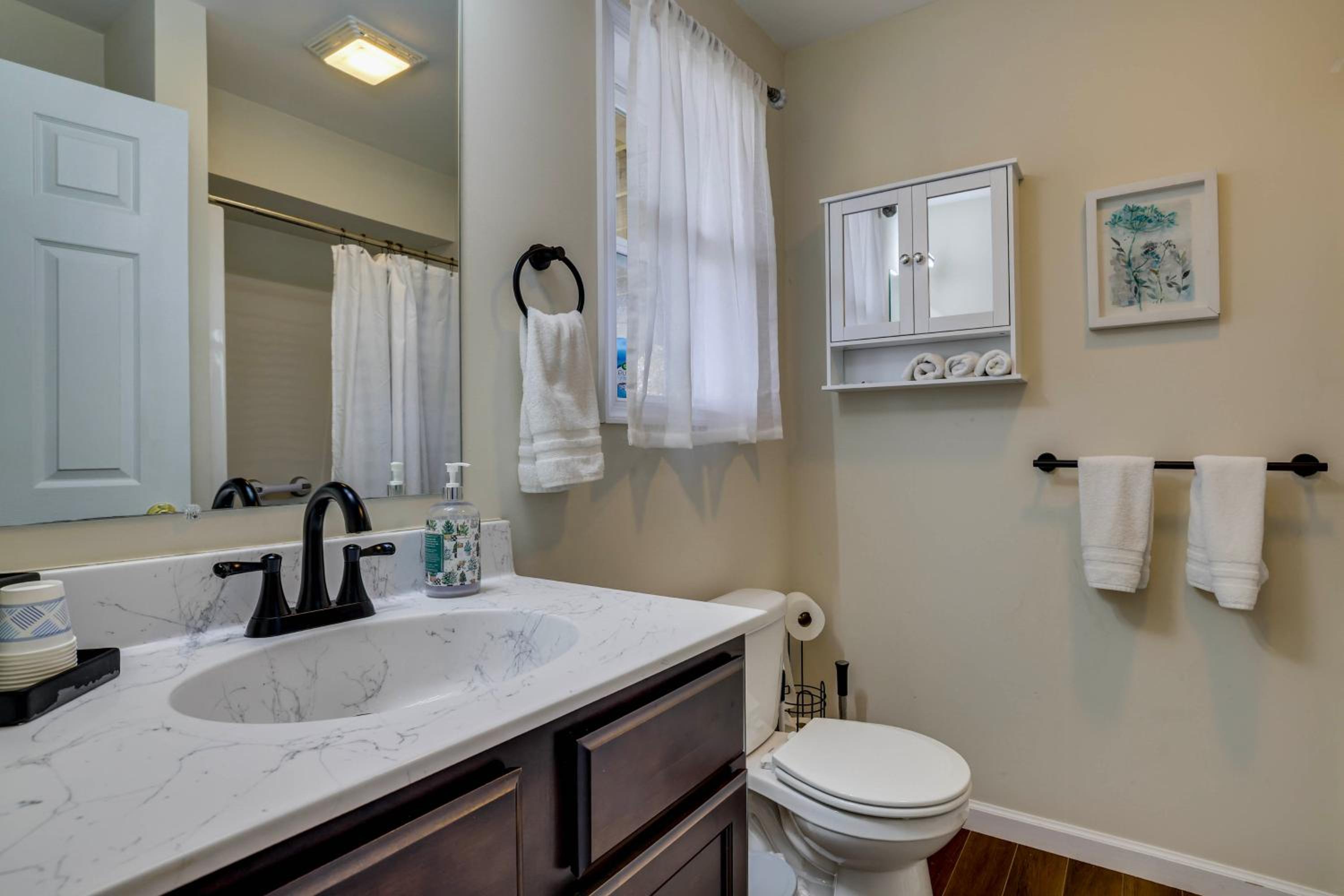 Lakefront Pocono Retreat with Hot Tub and Movie Hub