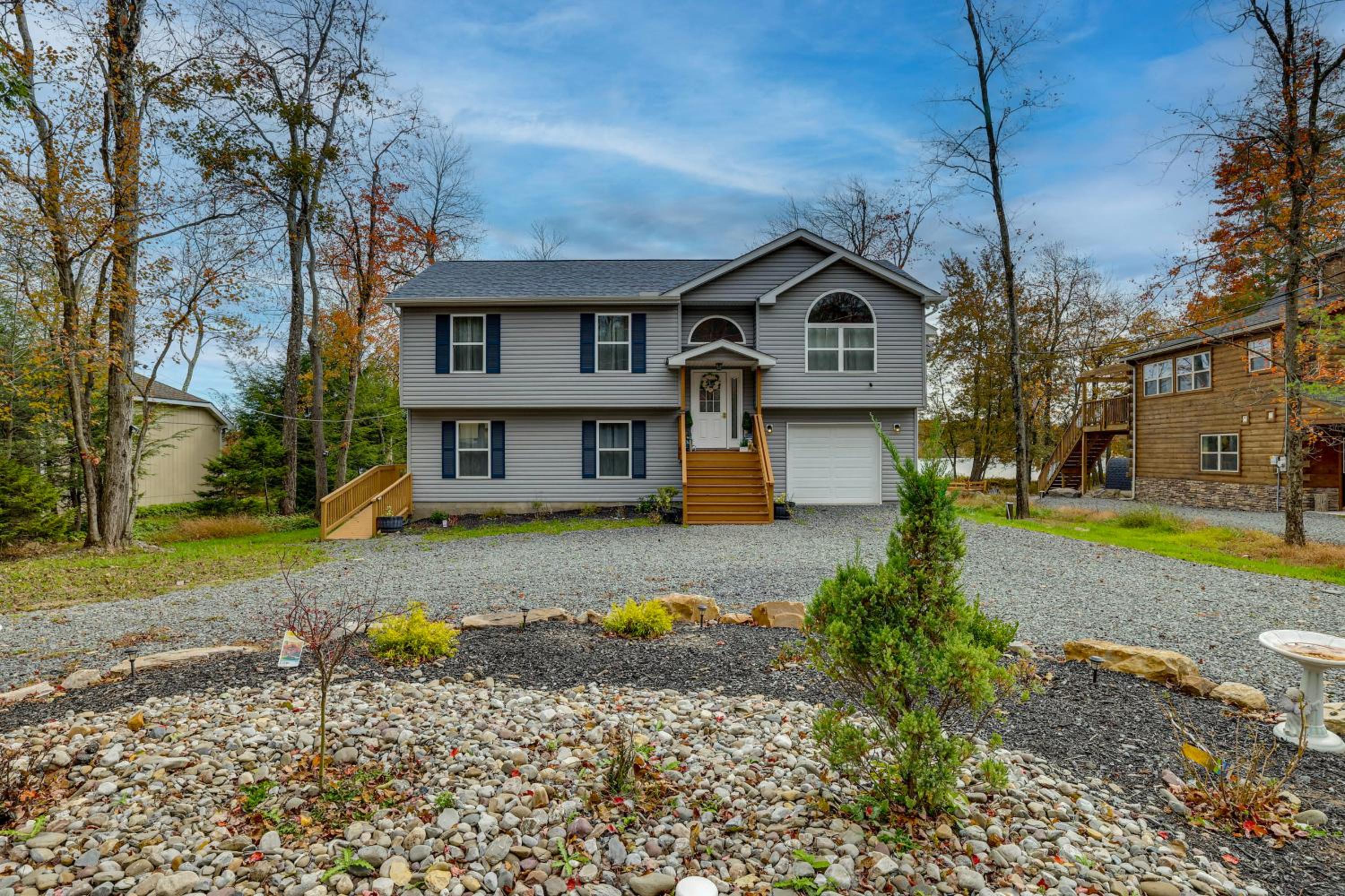 Lakefront Pocono Retreat with Hot Tub and Movie Hub