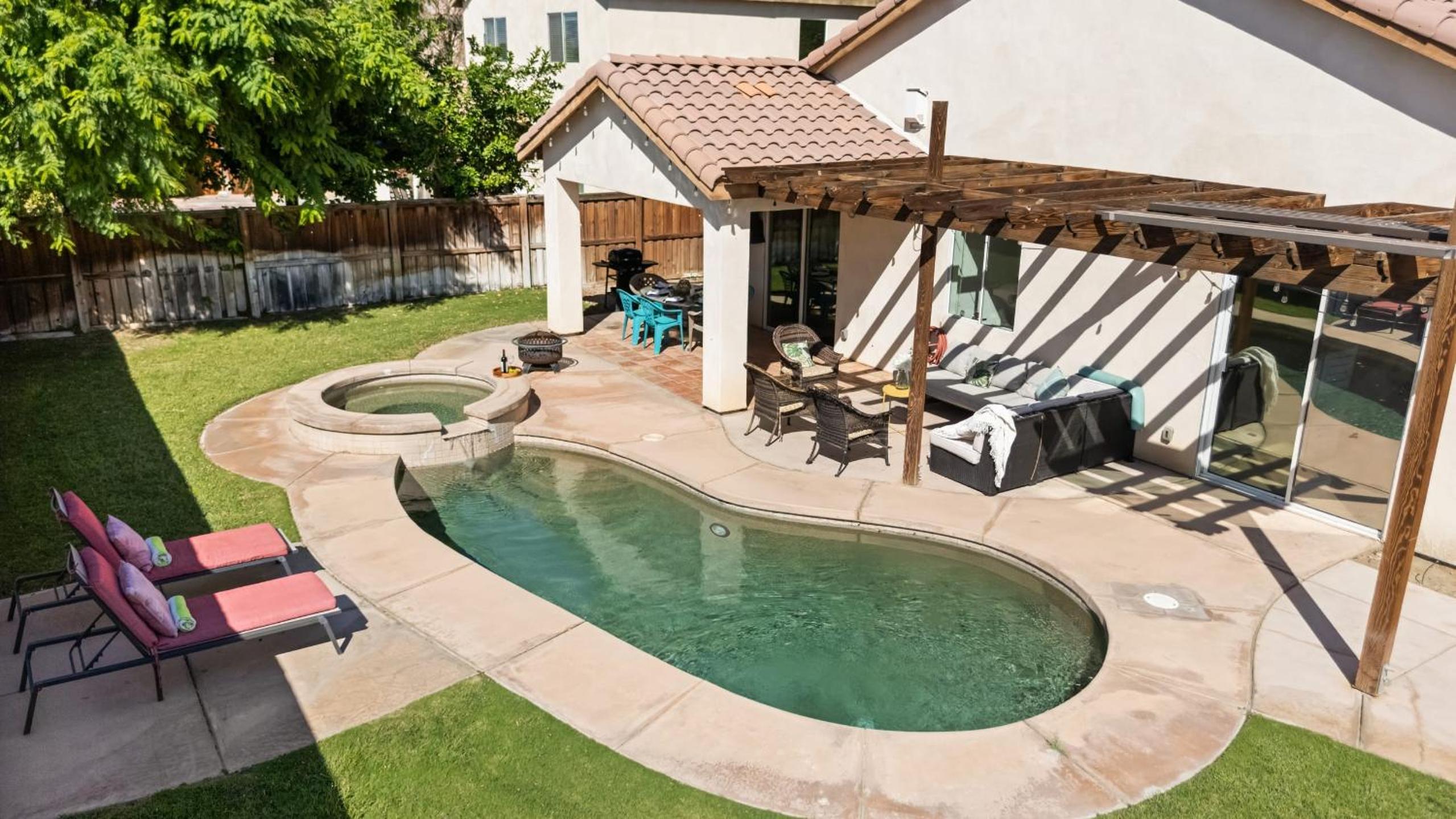 Desert Oasis w Pool Spa BBQ Outdoor Dining Under the Palms Calle Tolosa by AvantStay