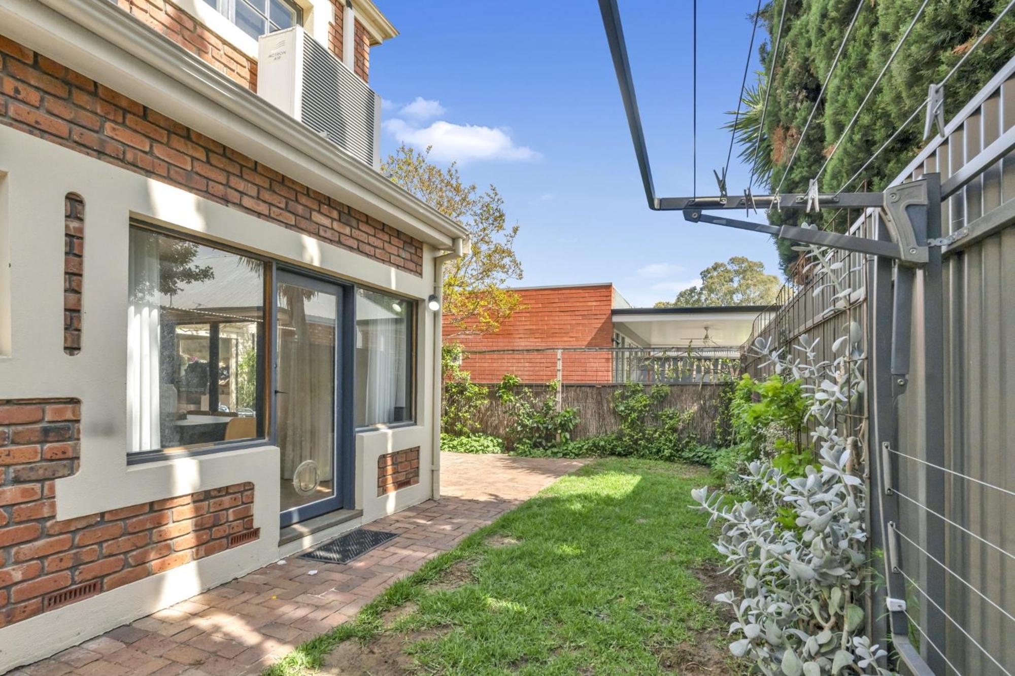 Family Retreat with Balcony and Courtyard