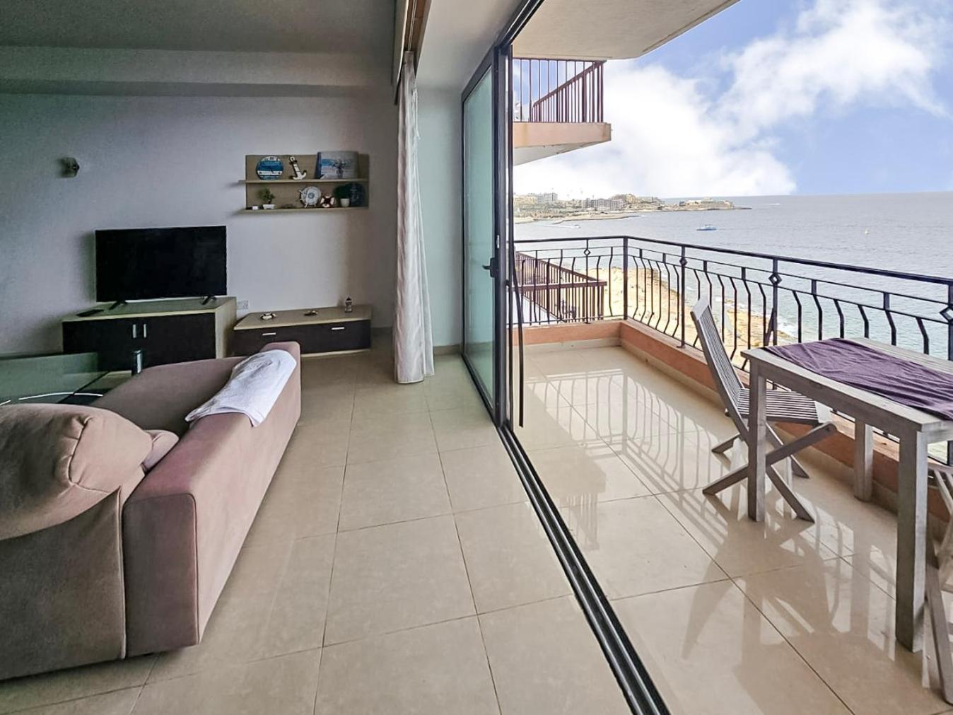 Large Seafront 3-Bedroom Apartment in Sliema with Stunning Views and Parking SV 5