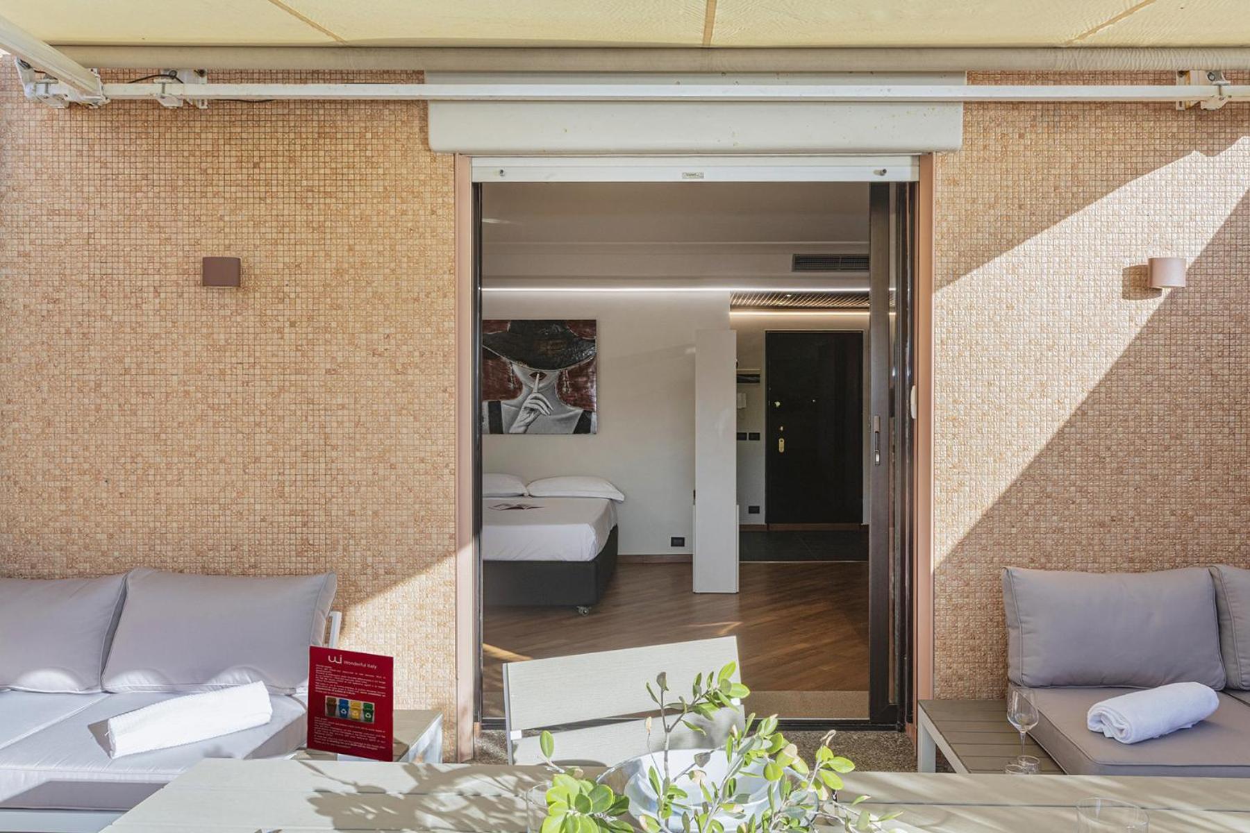 Beachfront Studio with Terrace by Wonderful Italy