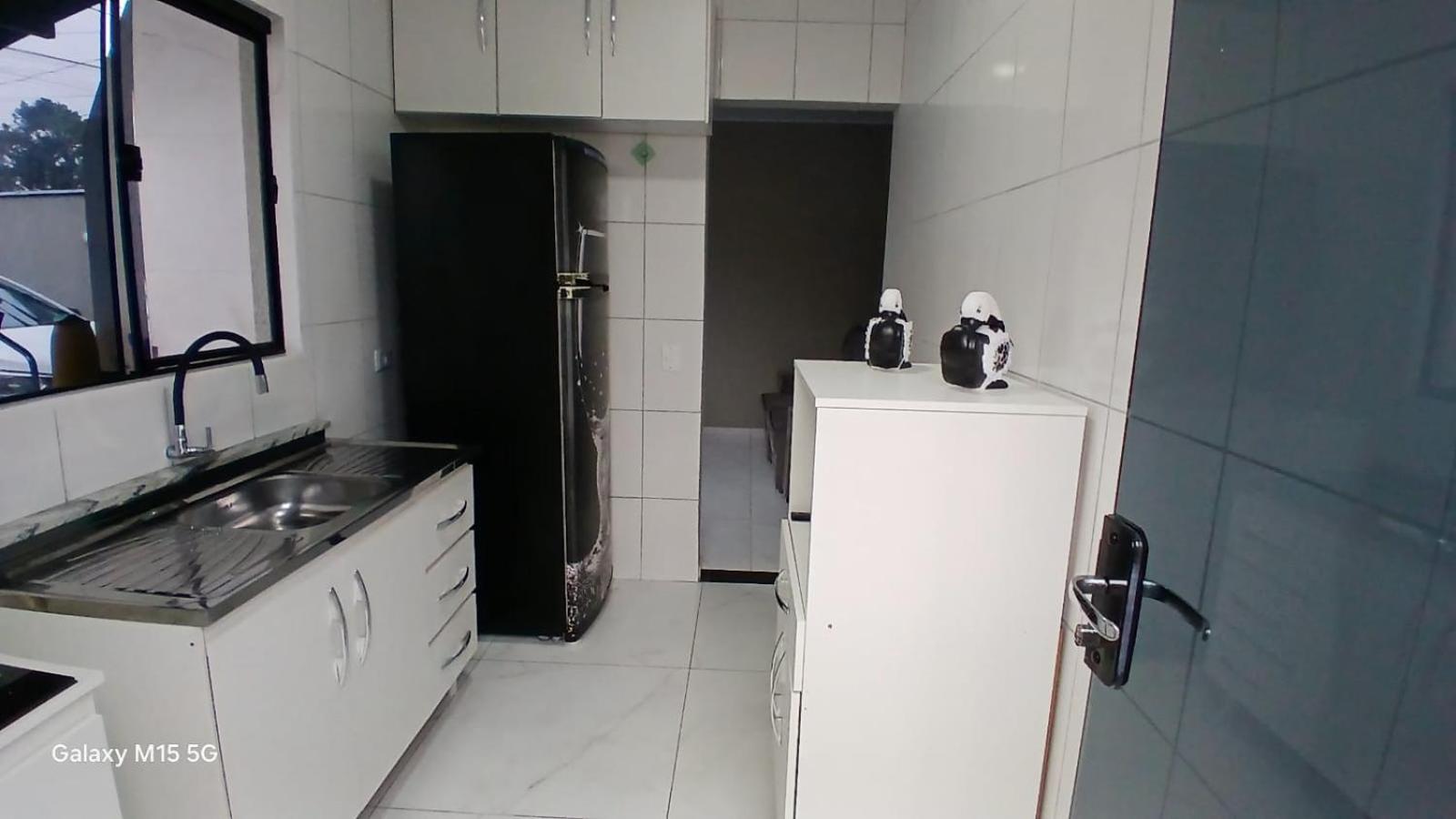 aconchegante com piscina e churrasqueira, pertinho da praia
