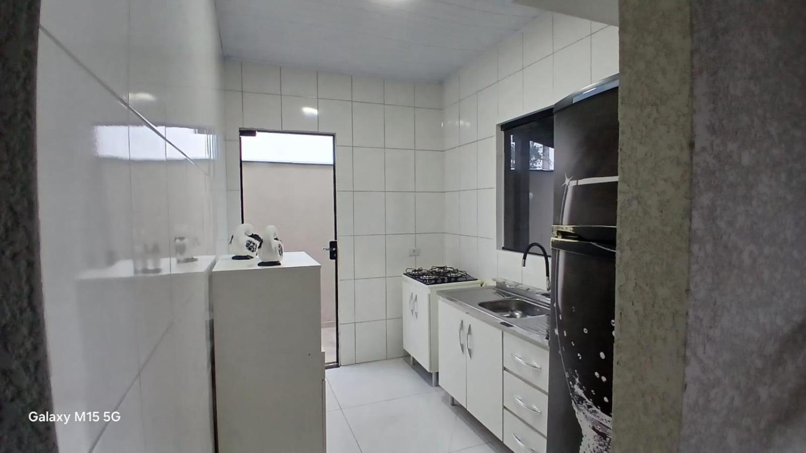 aconchegante com piscina e churrasqueira, pertinho da praia