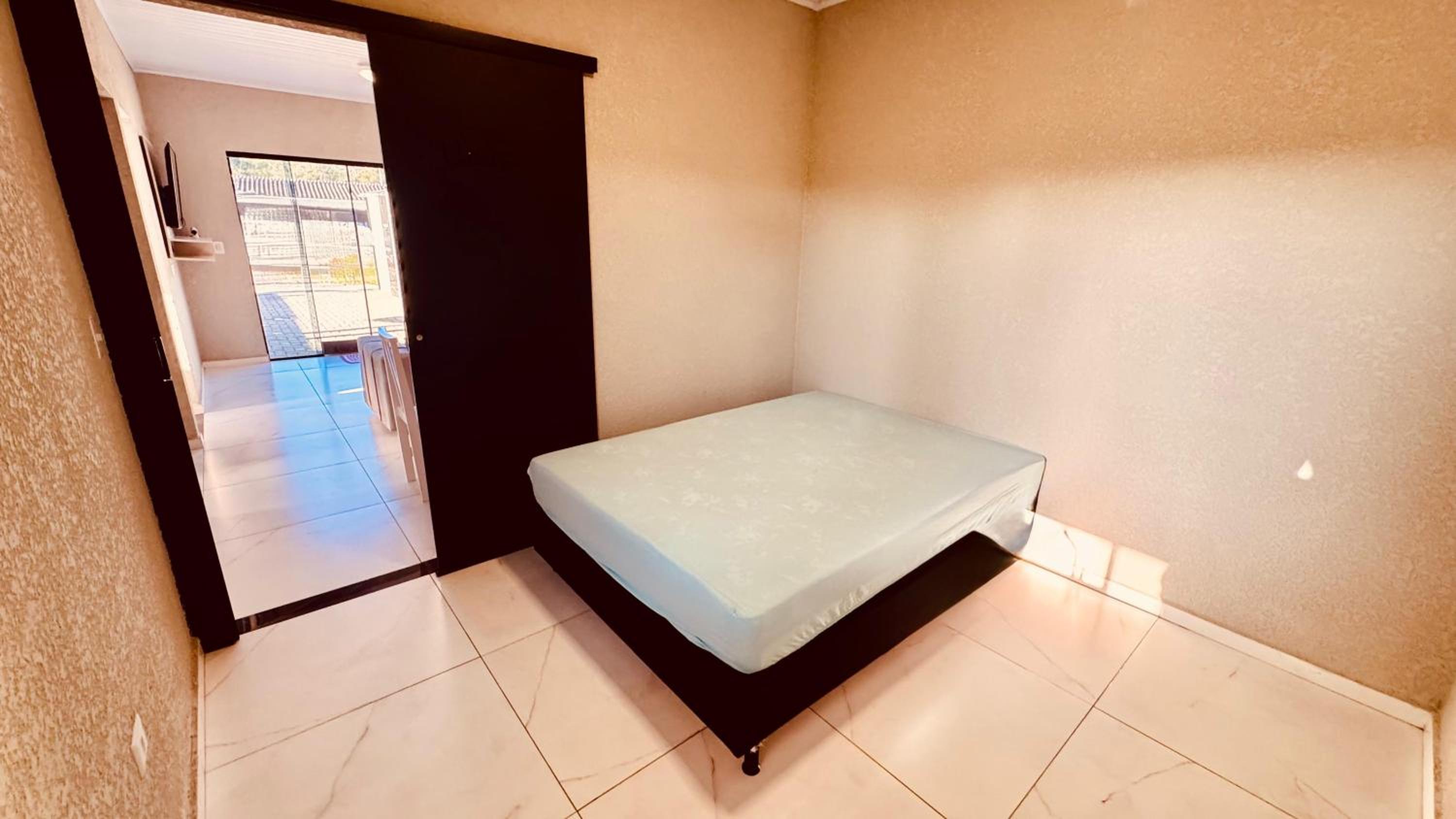 aconchegante com piscina e churrasqueira, pertinho da praia