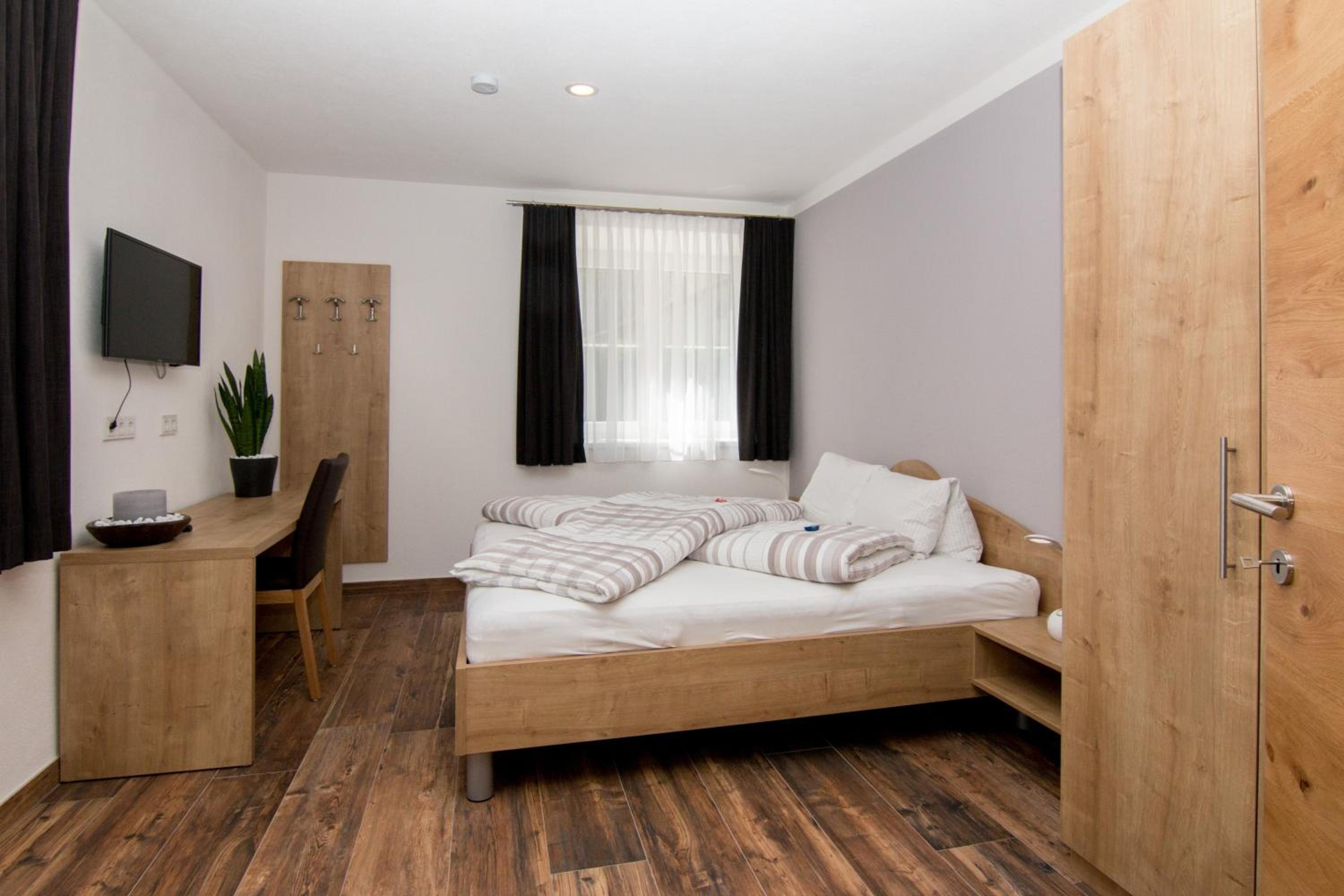 Haus Arnold - Privatzimmer und Ferienwohnungen