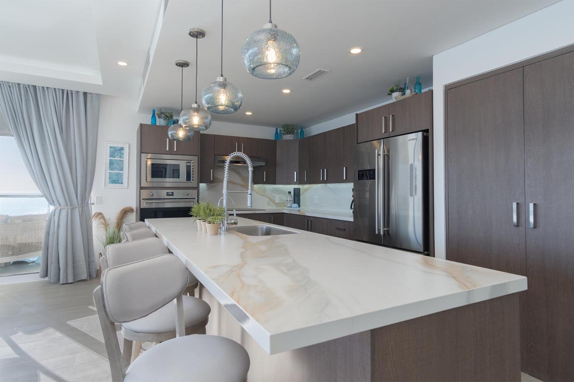 Impressive & beautiful 3 bedroom end unit Ocean Front Encantame C-1901