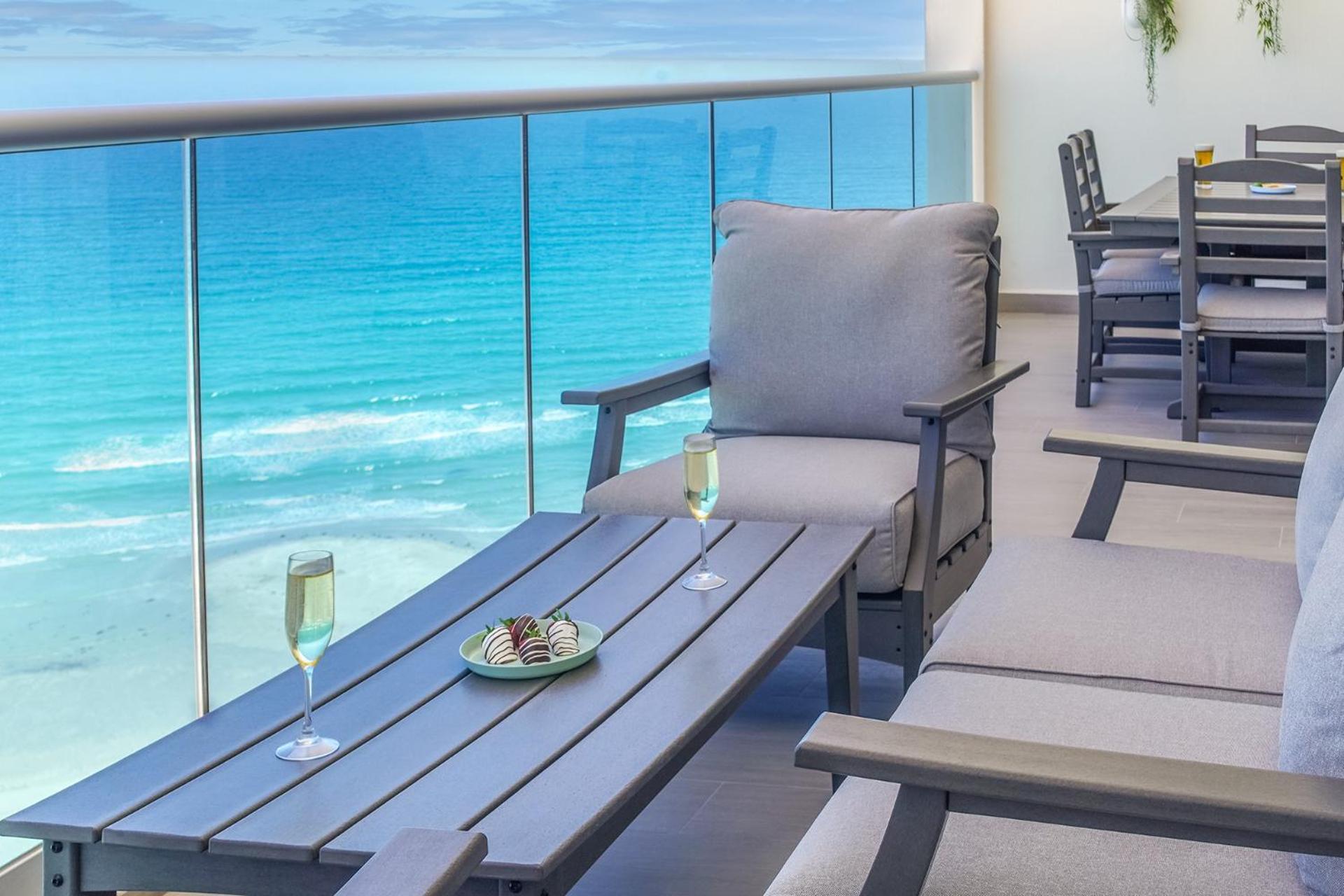 Relax in this modern ocean front condo Encantame E1404