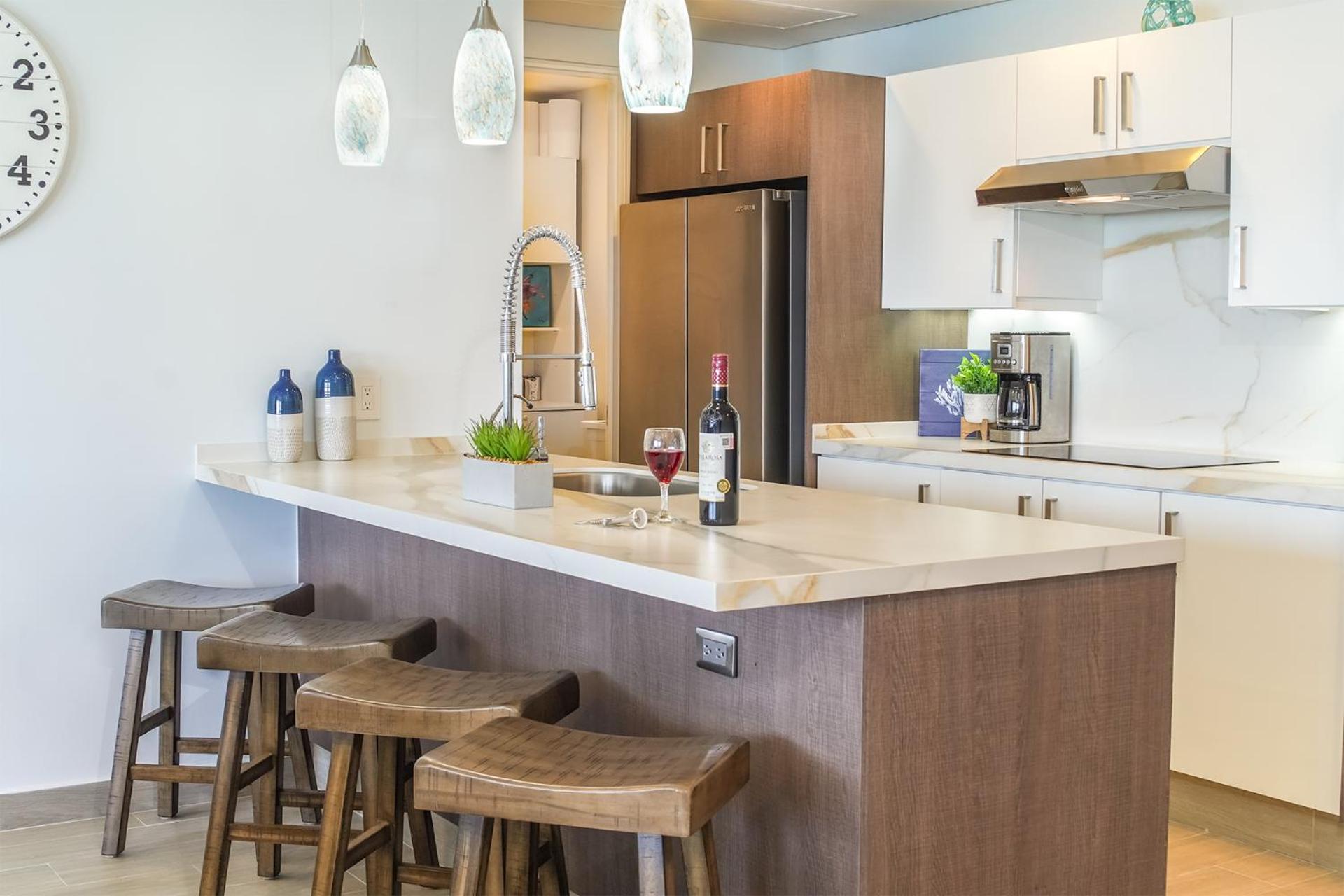 Relax in this modern ocean front condo Encantame E1404