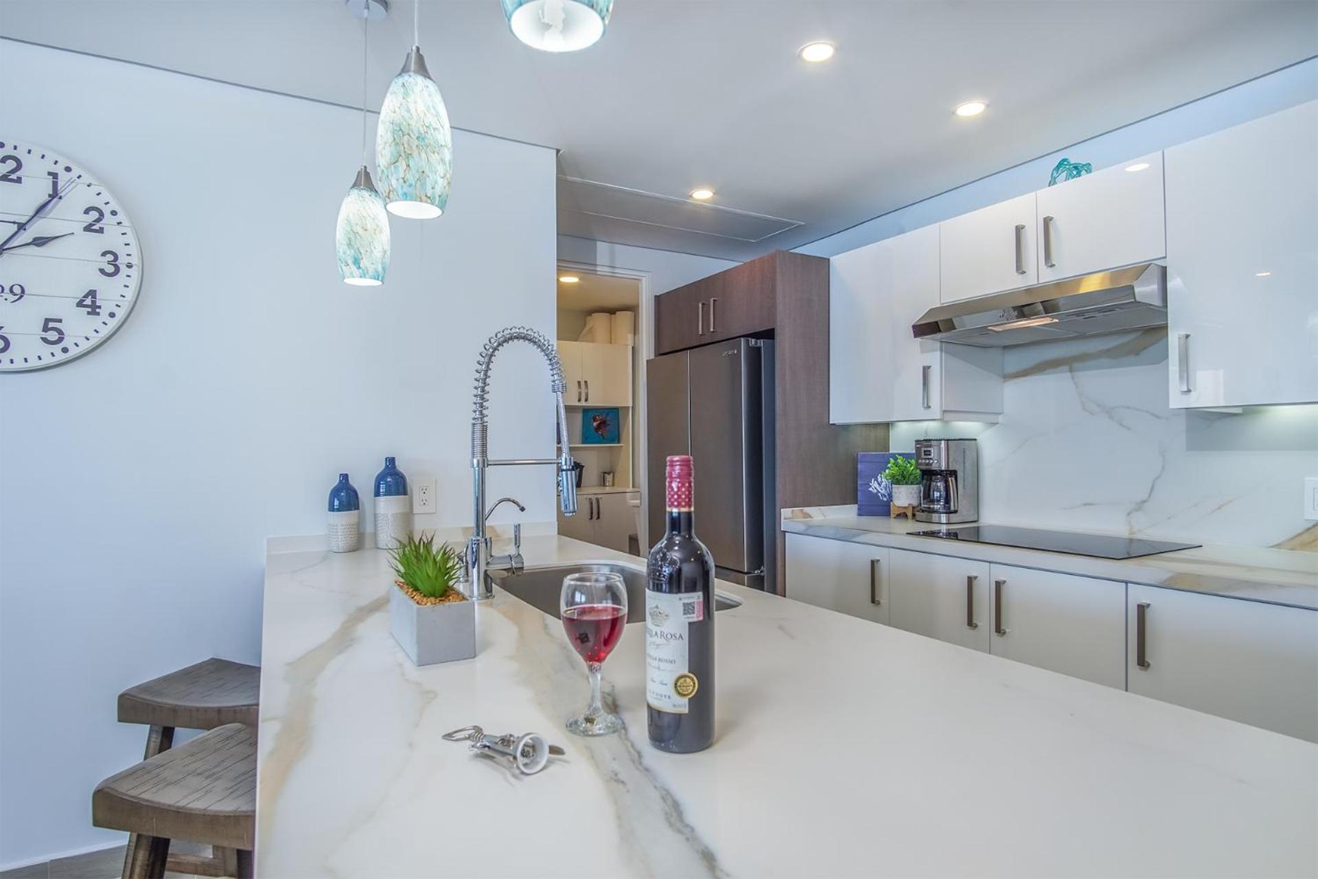 Relax in this modern ocean front condo Encantame E1404
