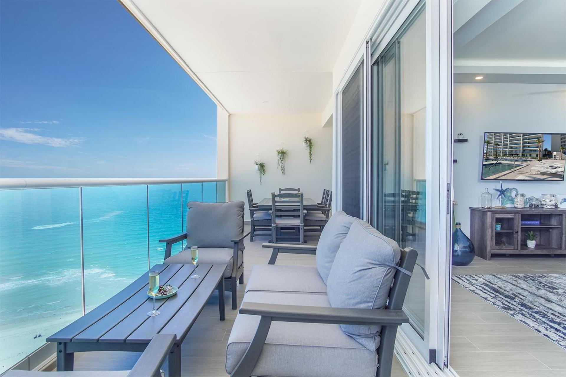 Relax in this modern ocean front condo Encantame E1404