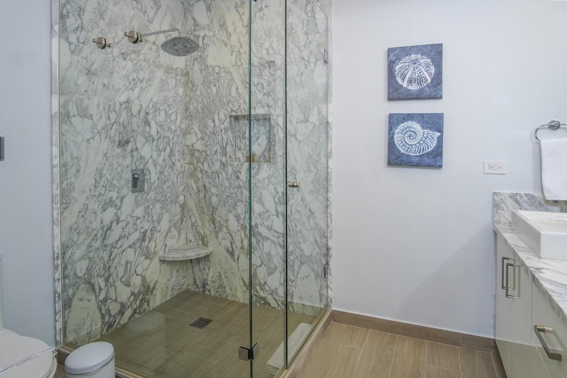 Relax in this modern ocean front condo Encantame E1404