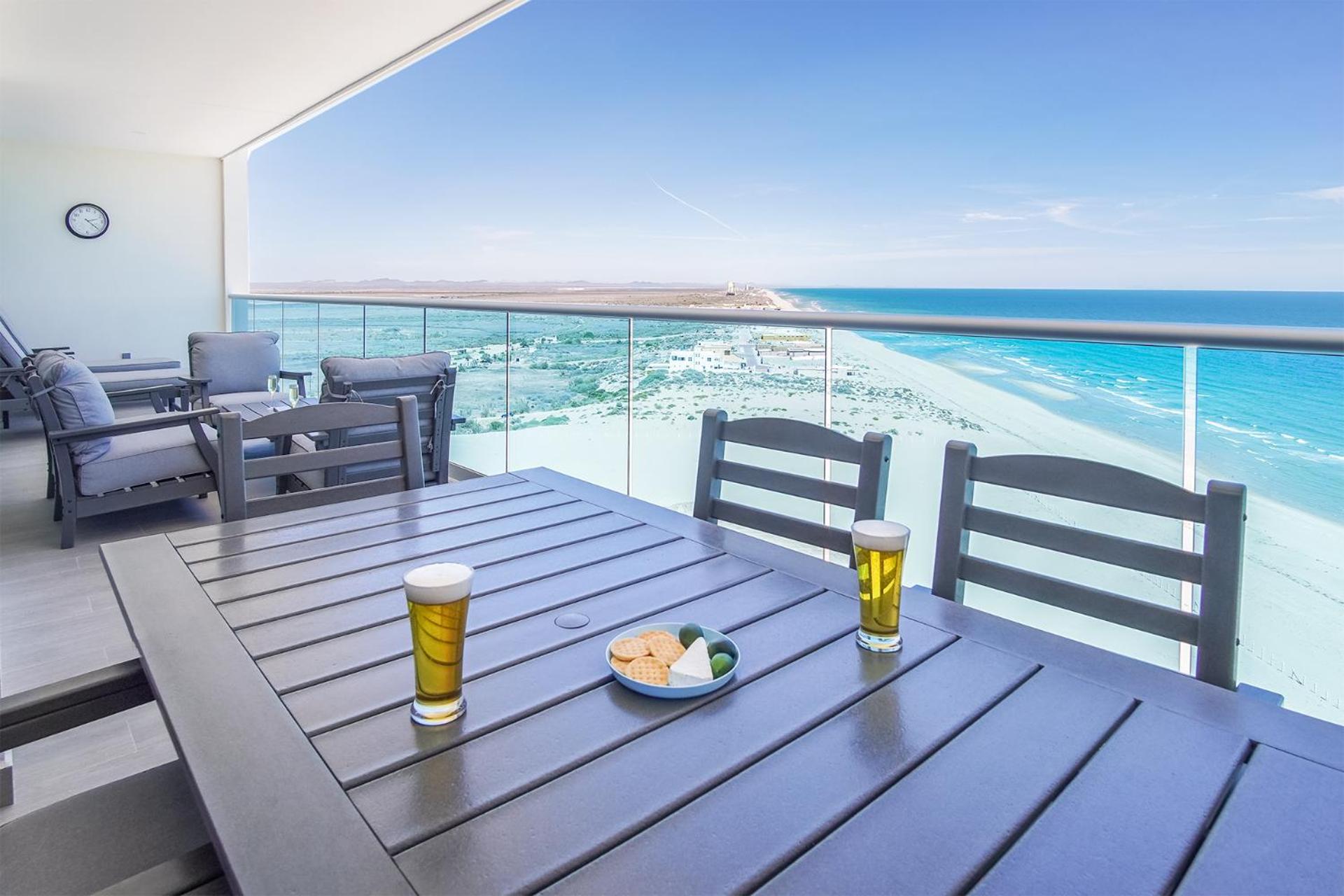 Relax in this modern ocean front condo Encantame E1404