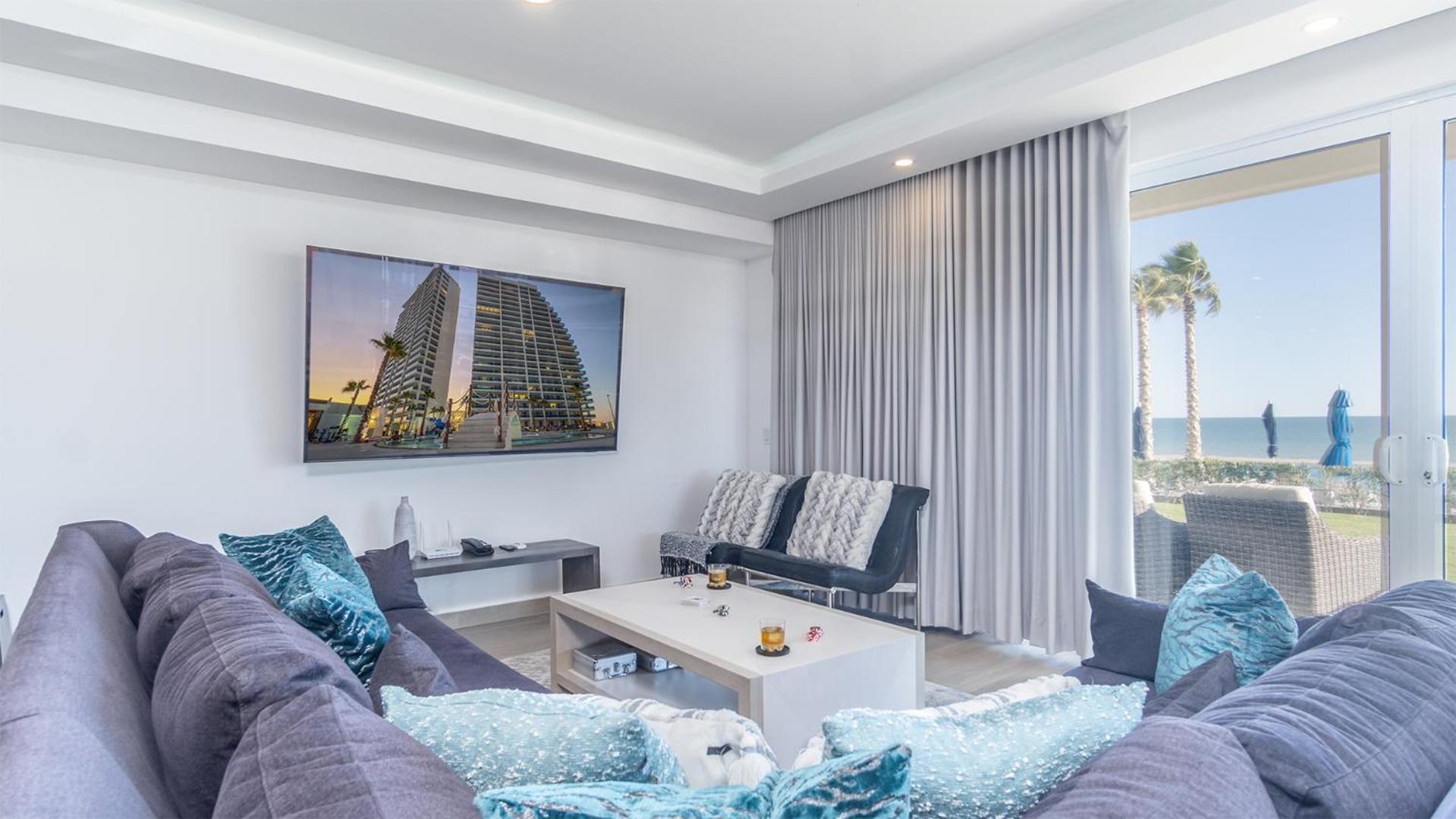 New and Amazing 3 bedroom Ground Floor Corner Beach Front Encantame C-101