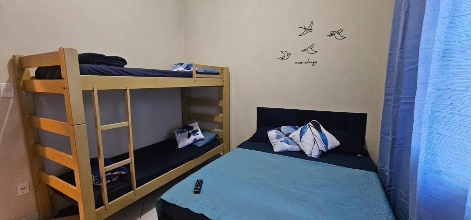 Pousada II House Beach Brasil , Suites com banheiros Privativos, PISCINA com cascata e área familiar para churrasco, Garage GRATUITA, próx-praia da Aviação