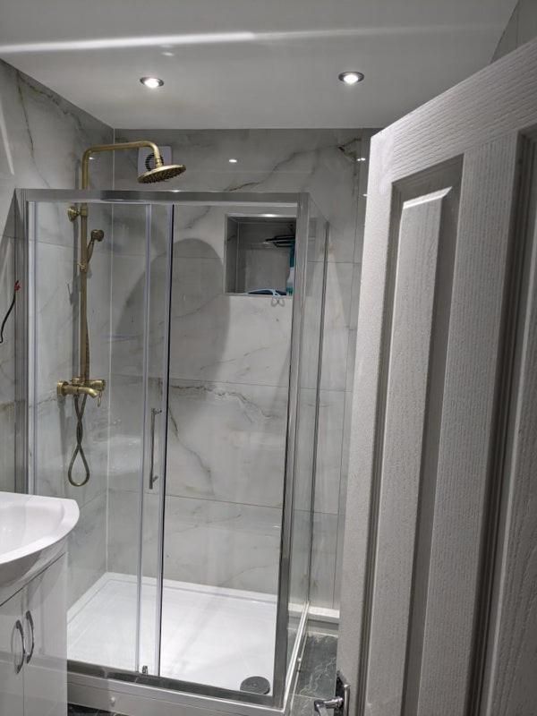 Private guest suite inside a family home with own entrance, kitchen, and bathroom