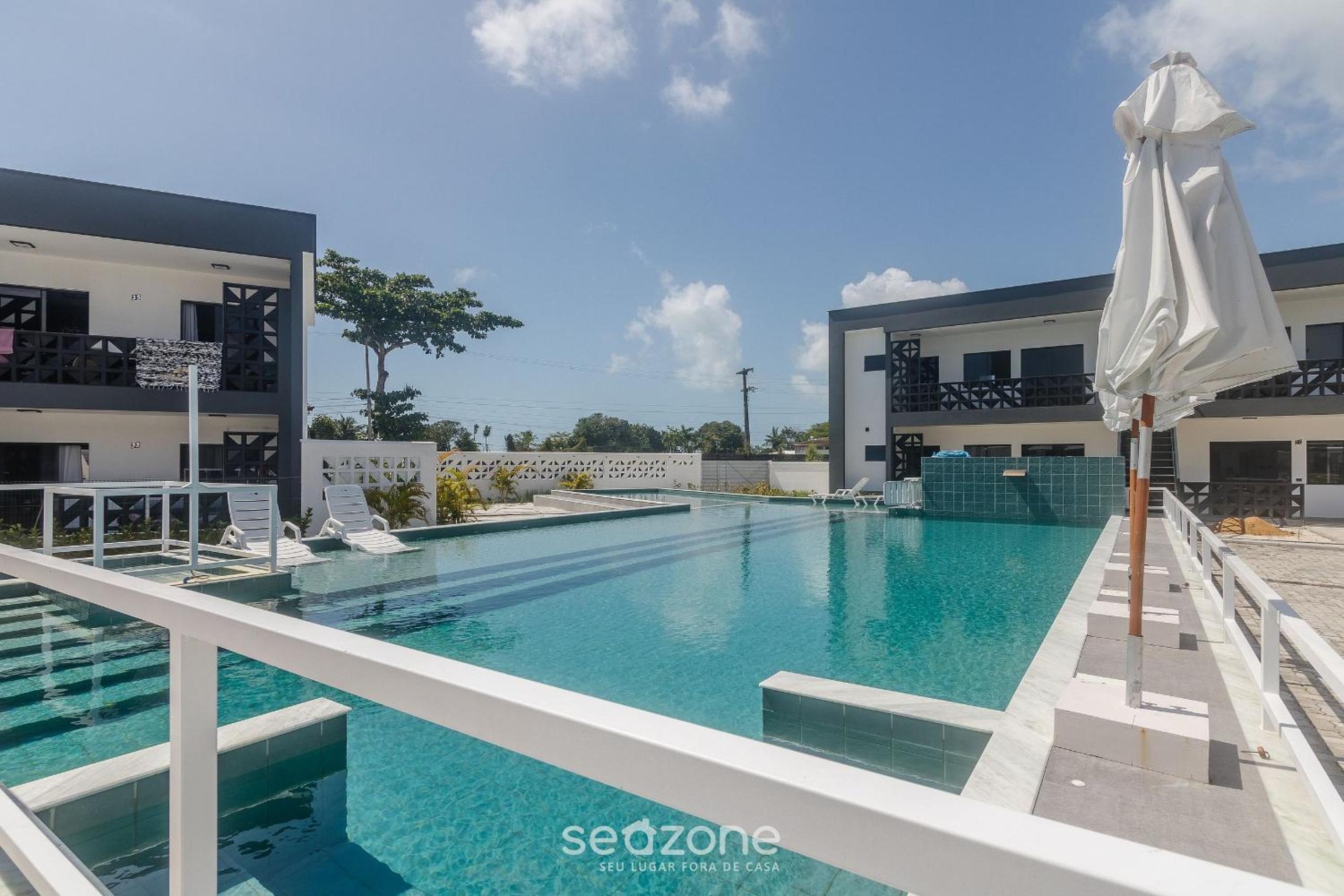 Apts in a condo with barbecue and pool in the best location of Porto Seguro – DVBs