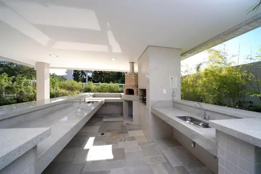 Home 12| Ap piscina aquecida pé na areia Bertioga