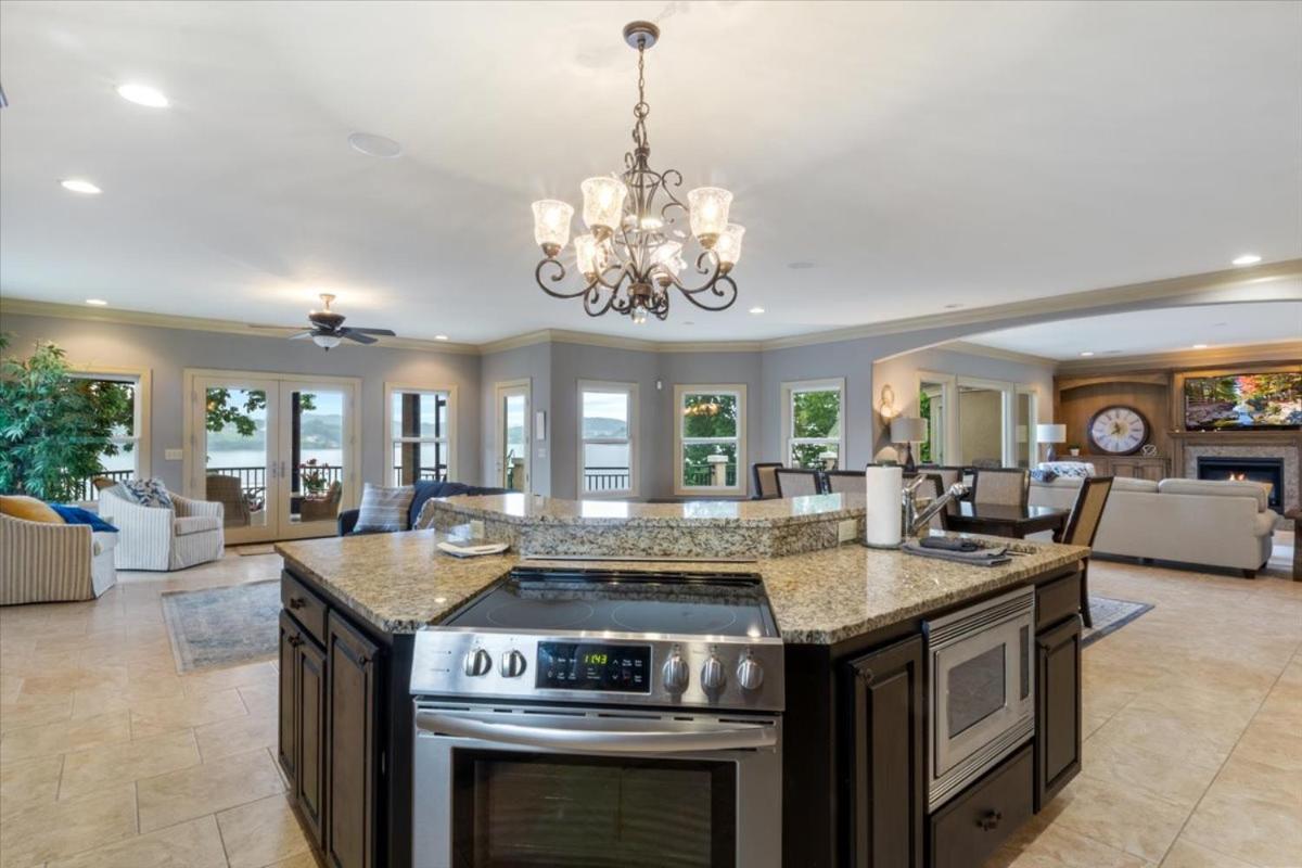 Luxury Lakefront Escape w/ Heated Pool, Hot Tub & Theater