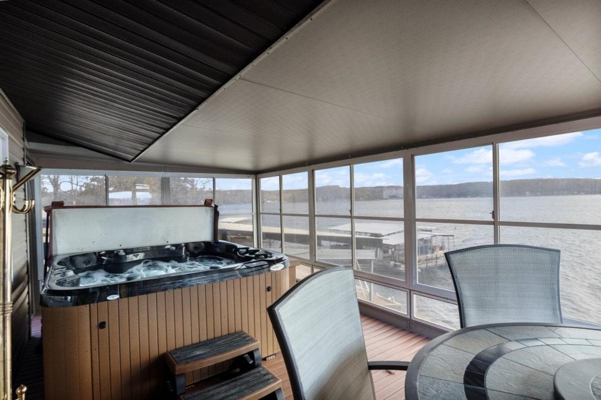 Newly Updated Interior, Sunroom w/ Hot Tub, Deck, Deep Water Dock, Boat & PWC Slips