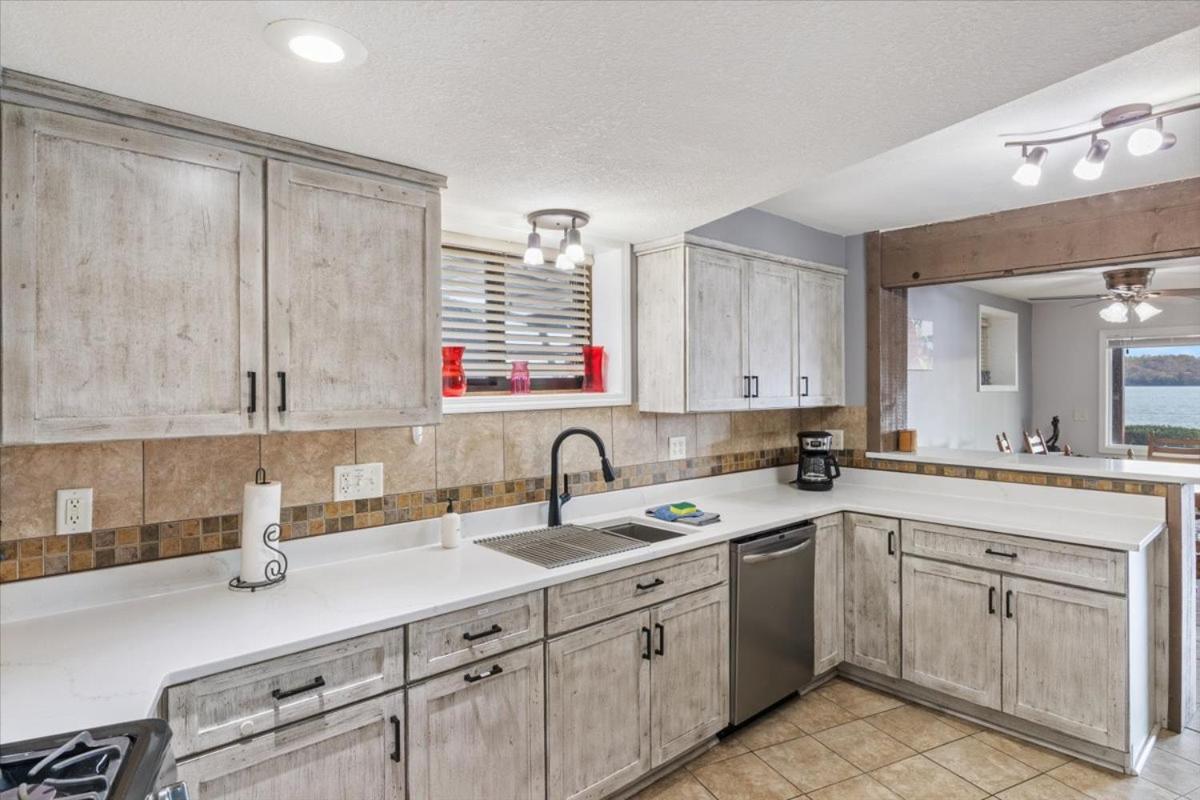 Newly Updated Interior, Sunroom w/ Hot Tub, Deck, Deep Water Dock, Boat & PWC Slips