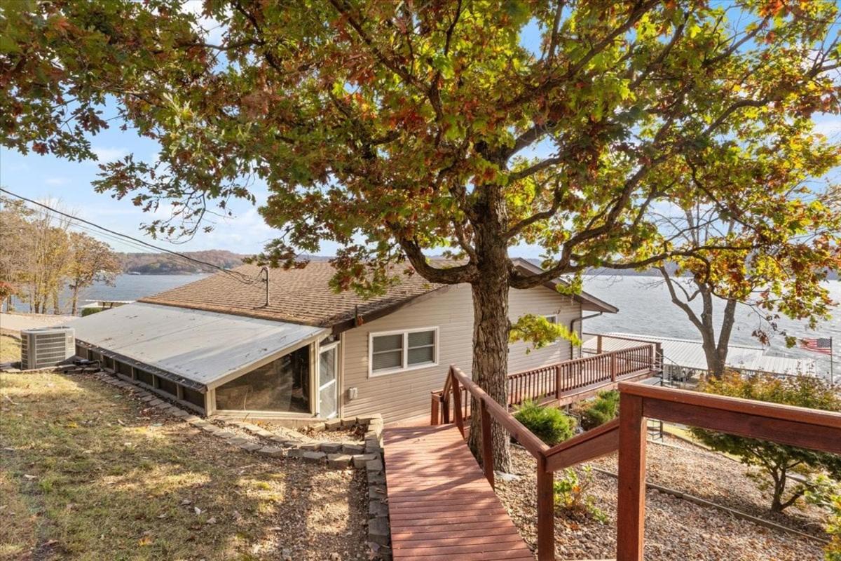 Newly Updated Interior, Sunroom w/ Hot Tub, Deck, Deep Water Dock, Boat & PWC Slips