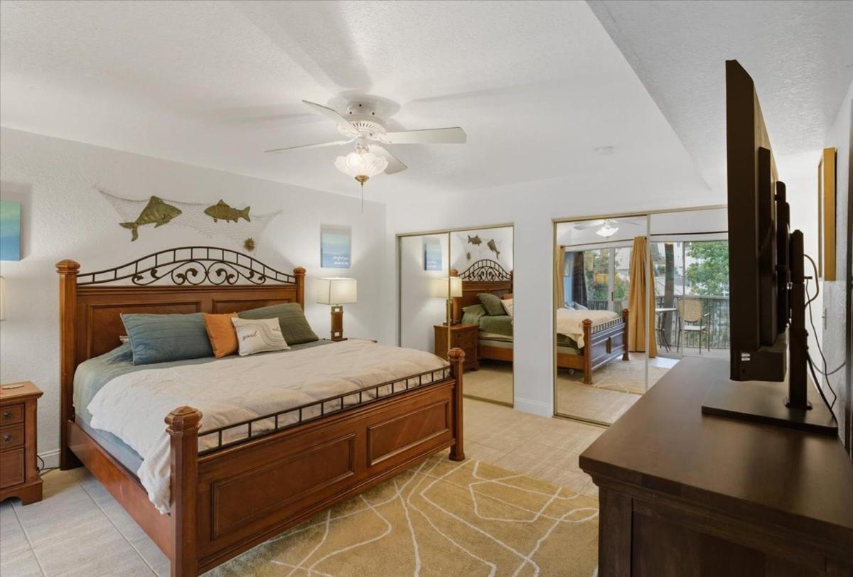 Lakefront Condo with 2 Pools, Courts, Trails & Patios at 12MM