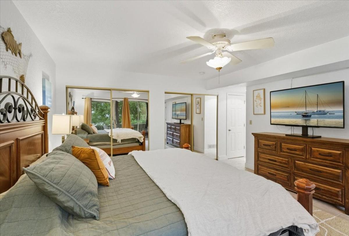 Lakefront Condo with 2 Pools, Courts, Trails & Patios at 12MM