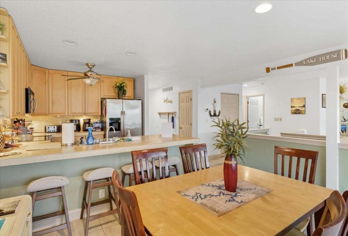 Lakefront Condo with 2 Pools, Courts, Trails & Patios at 12MM