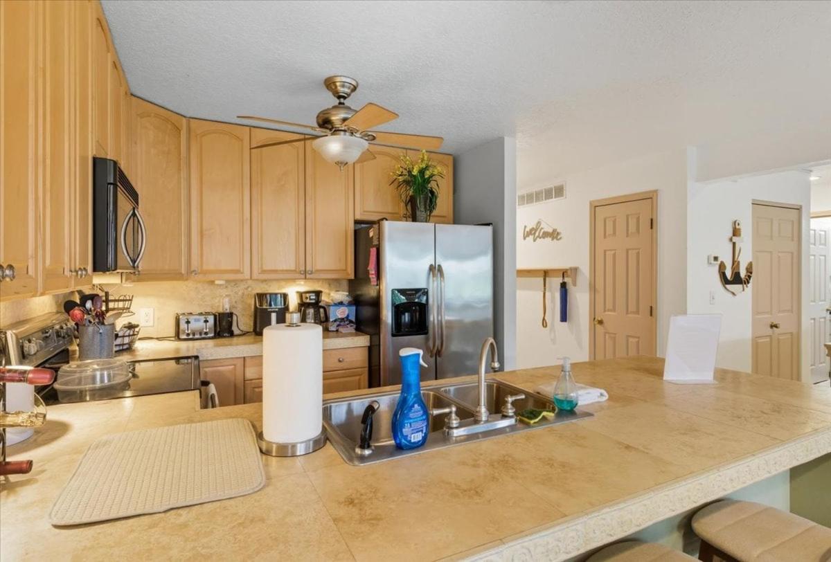 Lakefront Condo with 2 Pools, Courts, Trails & Patios at 12MM