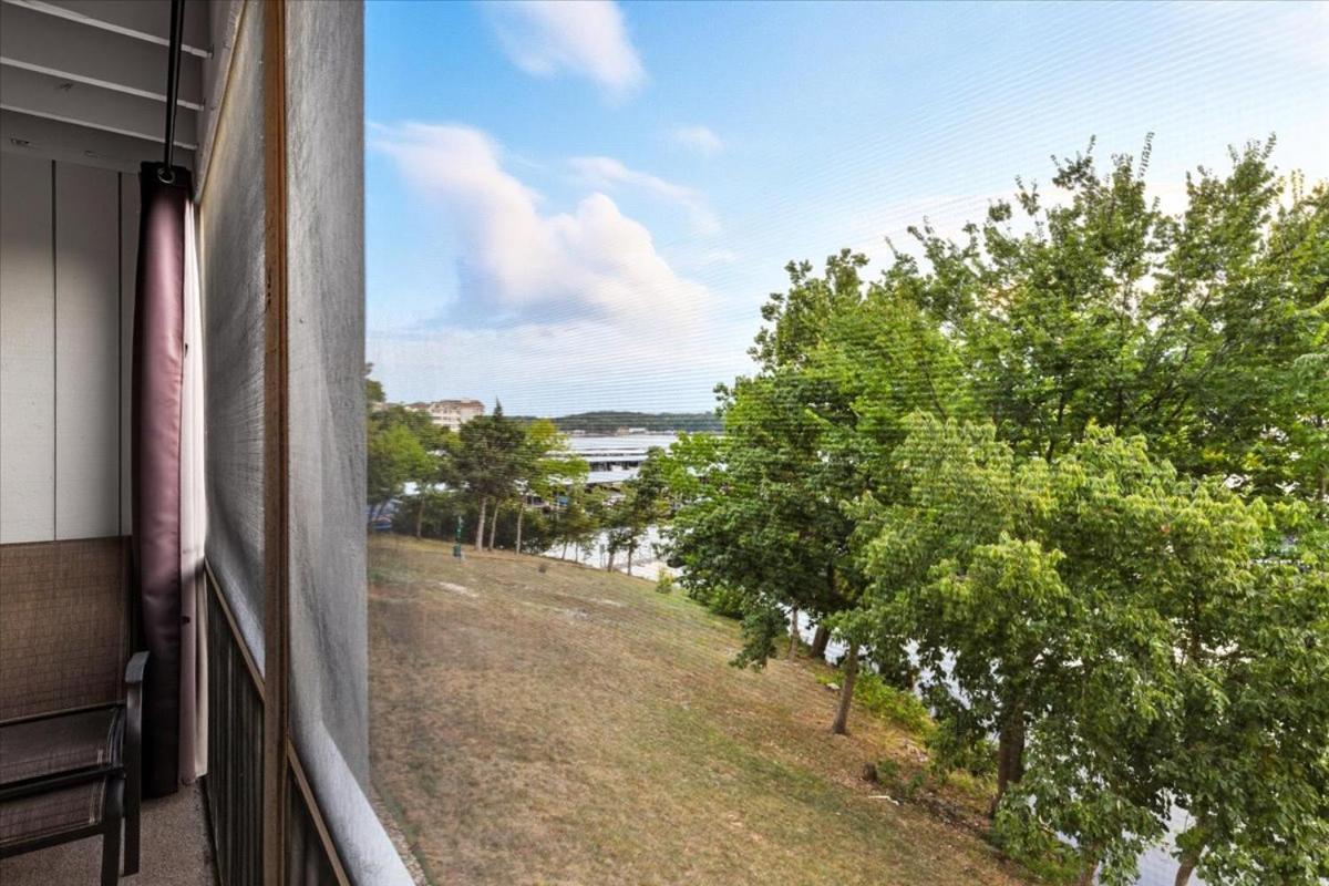 Lakefront Condo with 2 Pools, Courts, Trails & Patios at 12MM