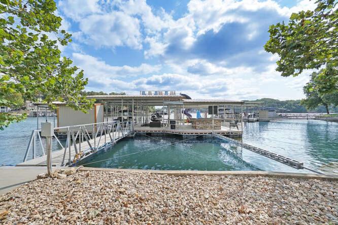 Luxury Home on Cove with Boat Slips, Waterslides, and Jump Deck
