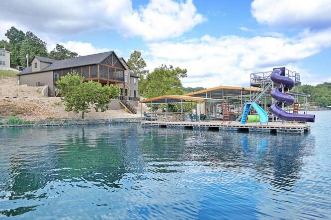 Luxury Home on Cove with Boat Slips, Waterslides, and Jump Deck