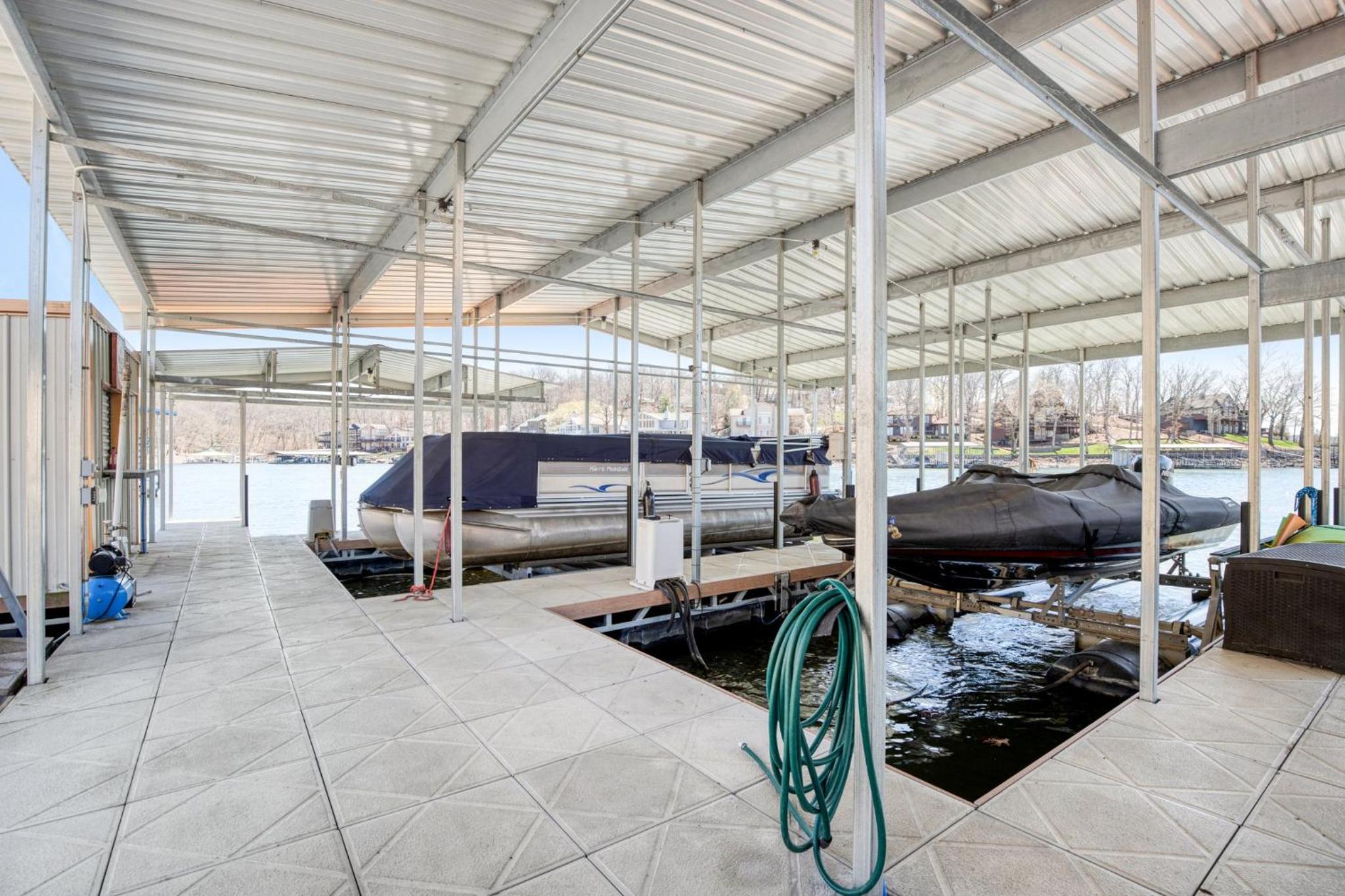 Luxury Home on Cove with Boat Slips, Waterslides, and Jump Deck