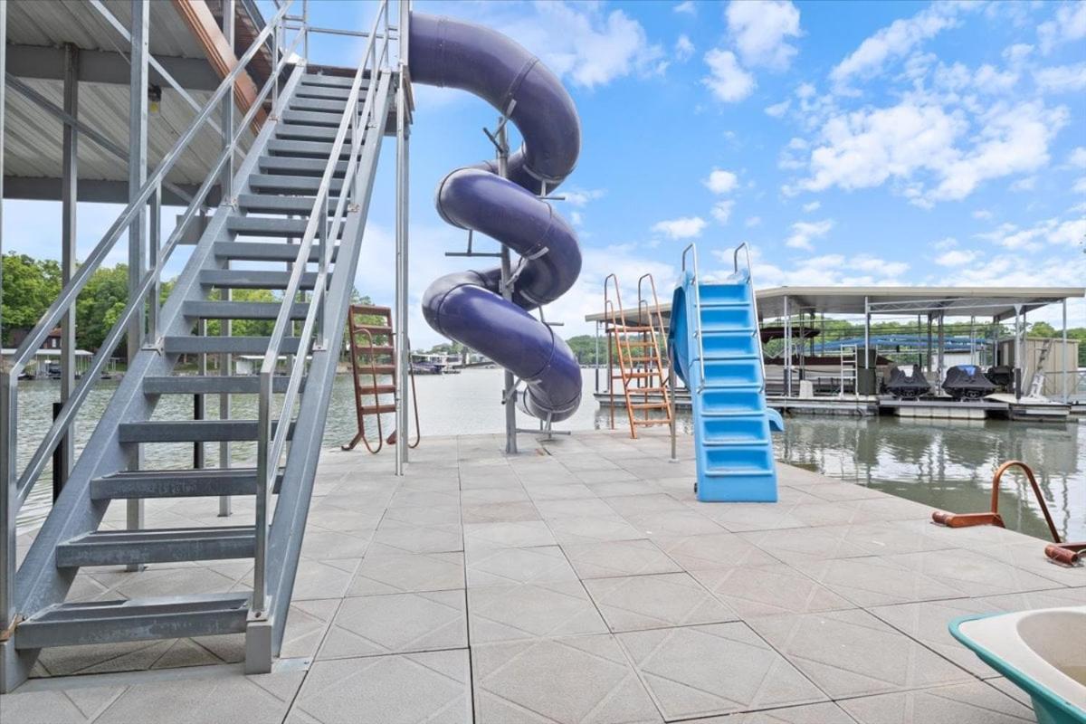 Luxury Home on Cove with Boat Slips, Waterslides, and Jump Deck