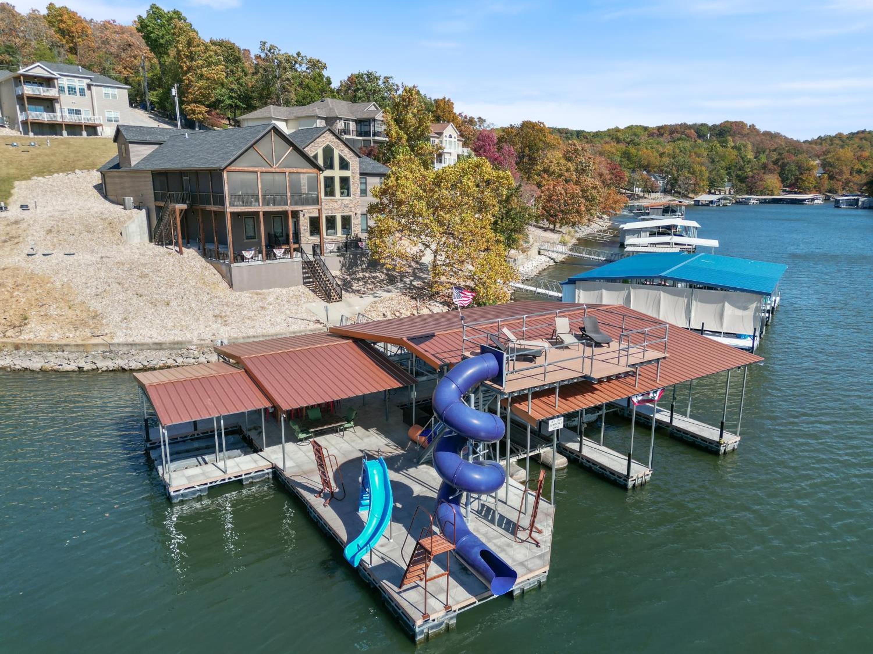 Luxury Home on Cove with Boat Slips, Waterslides, and Jump Deck